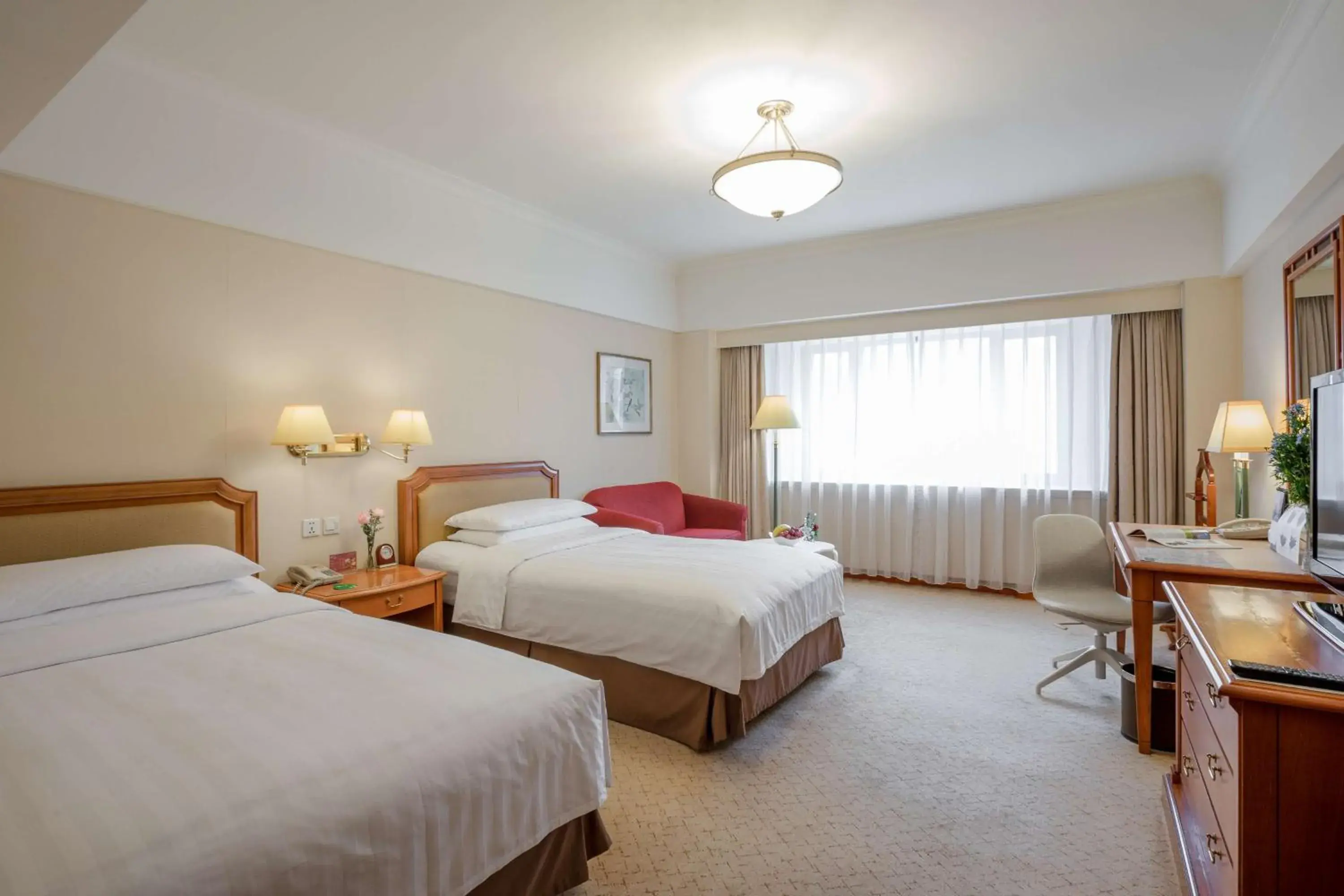 Living room, Bed in JEN Shenyang by Shangri-La Living room, Bed in JEN Shenyang by Shangri-La