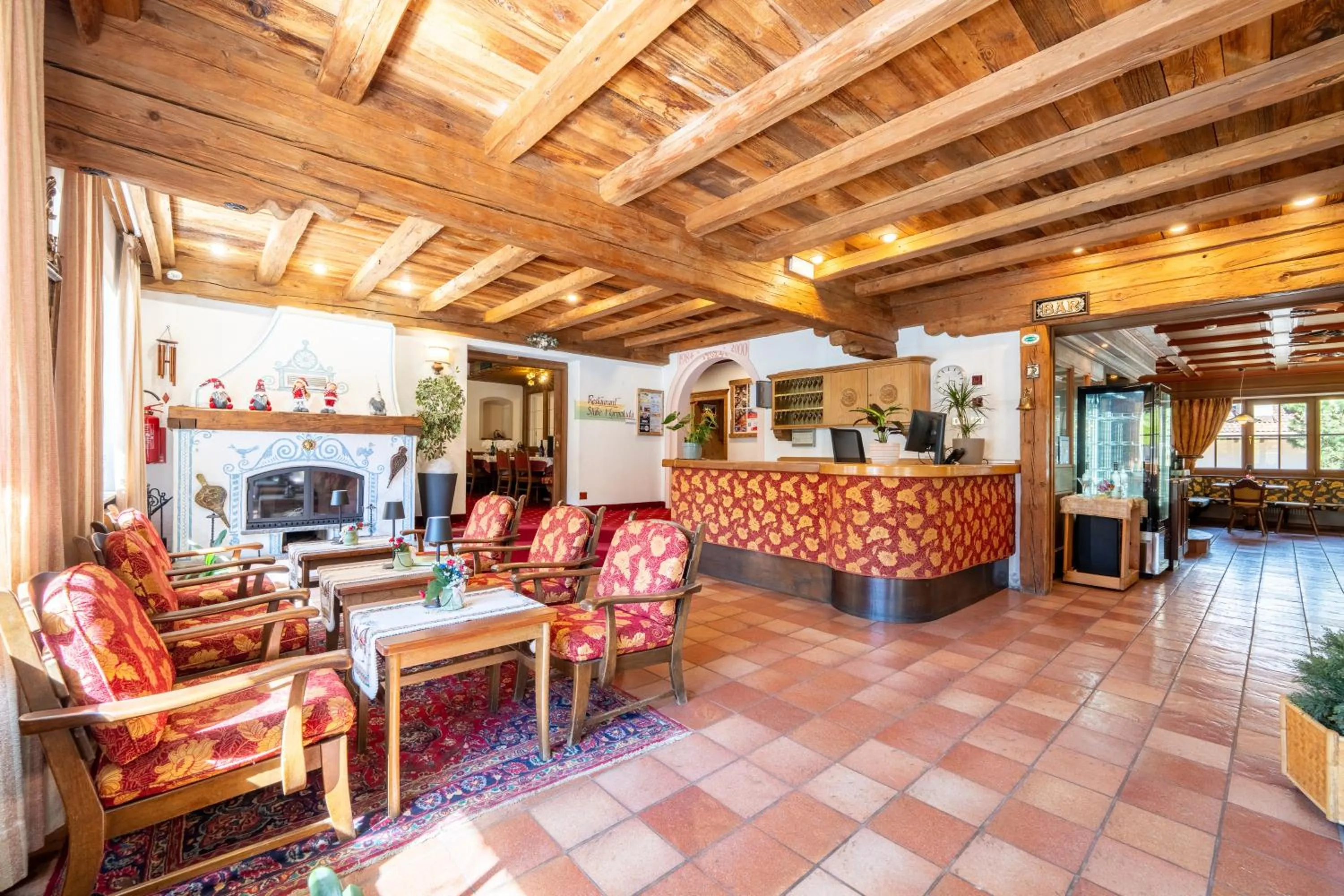 Communal lounge/ TV room in Hotel Dolomites Inn