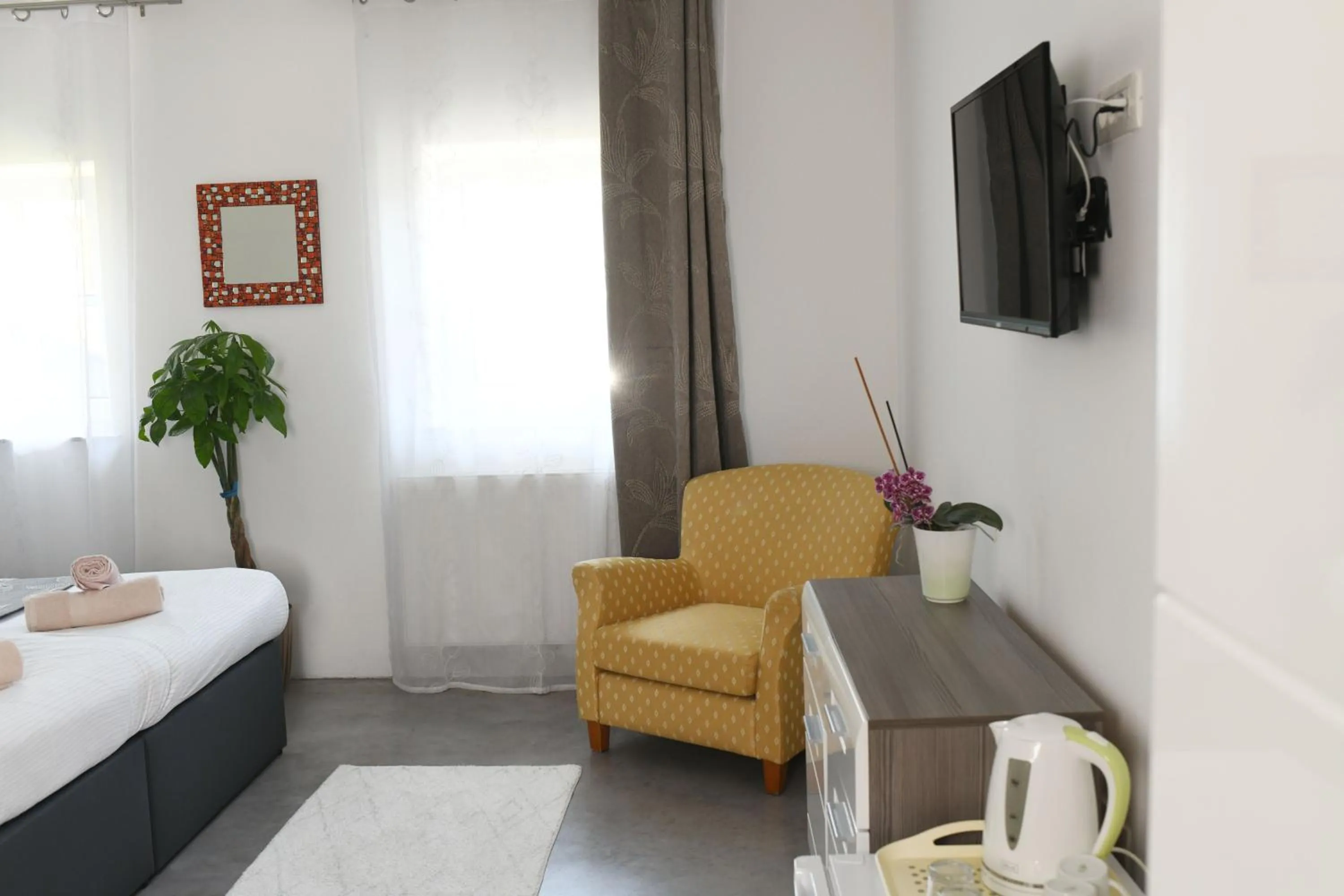 Seating area, Bed in Resort Vidmar near Bled - rooms Vidmar