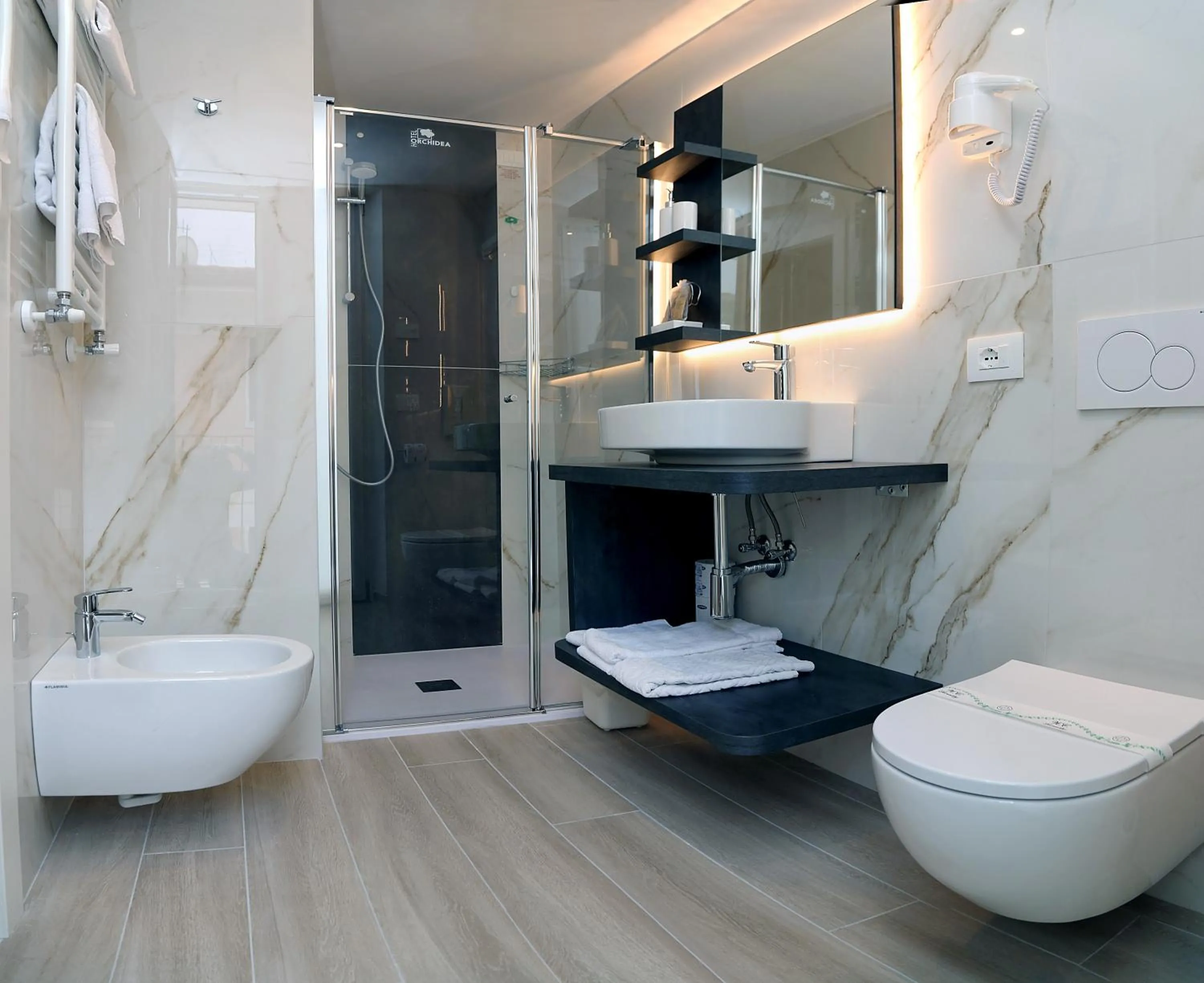 Bathroom in Hotel Orchidea