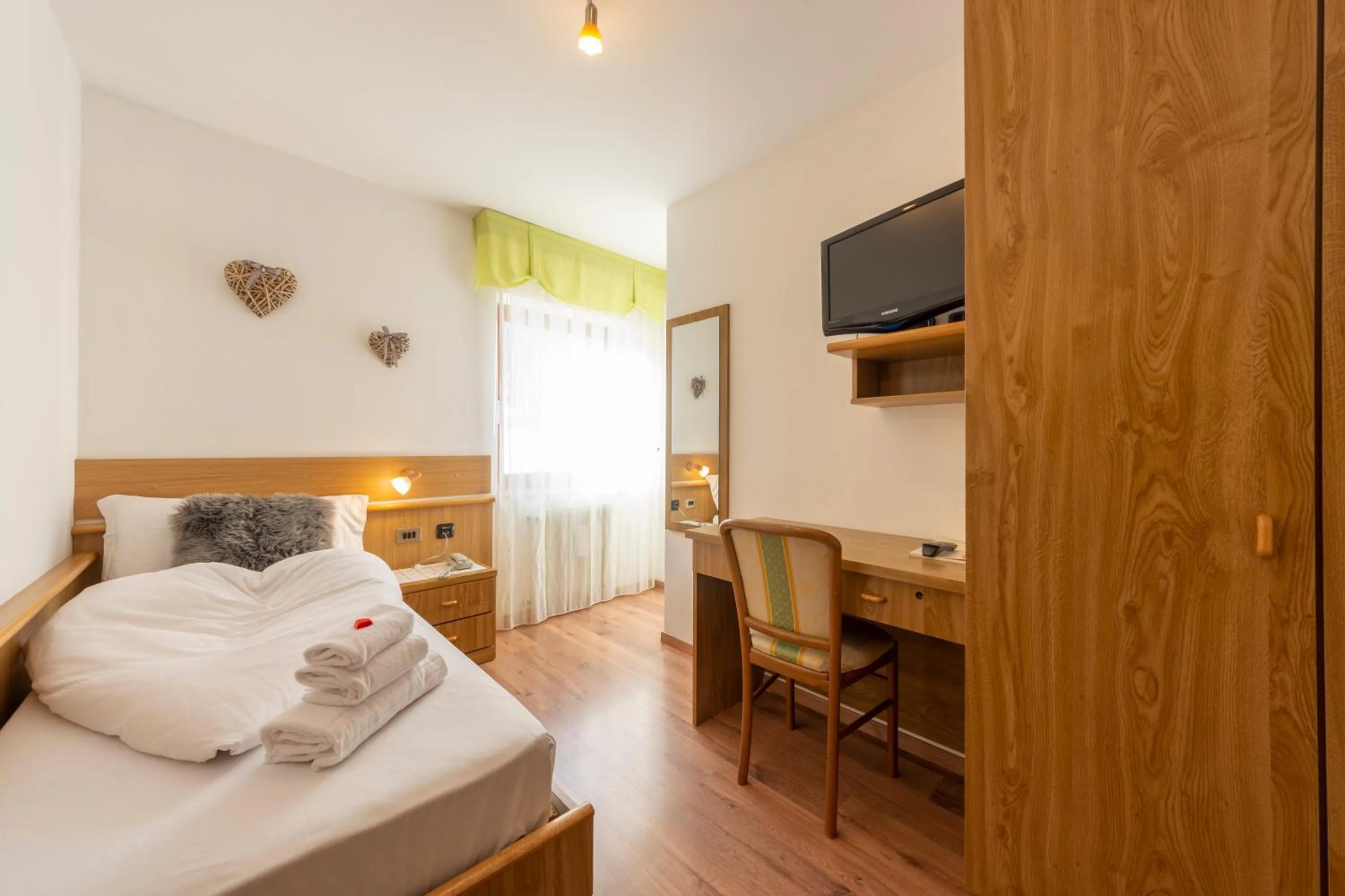 Bed in Hotel Ciampian