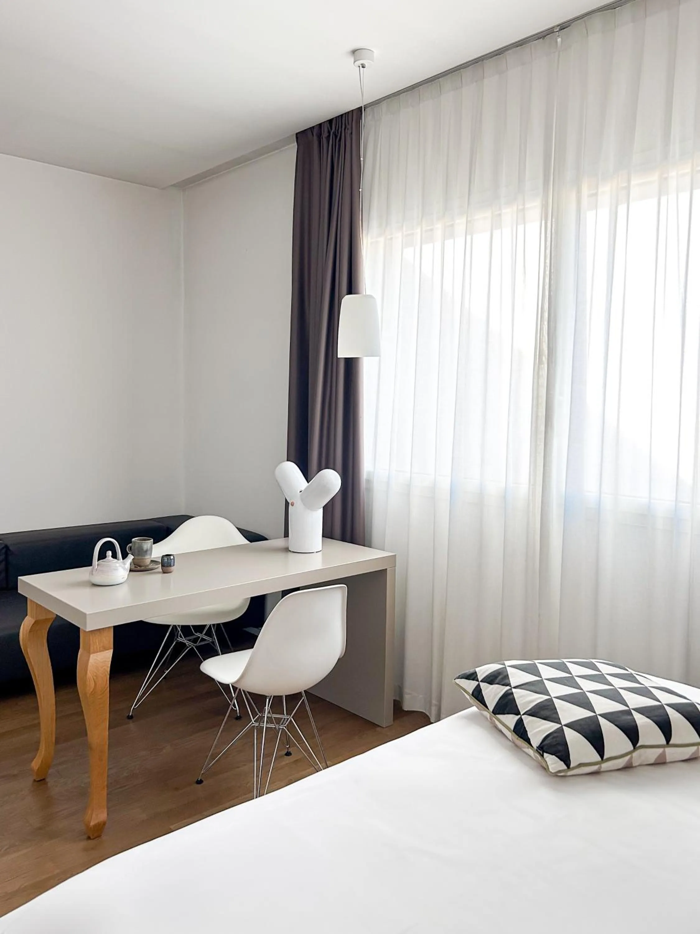 Seating area, Bed in Le Nove Hotel