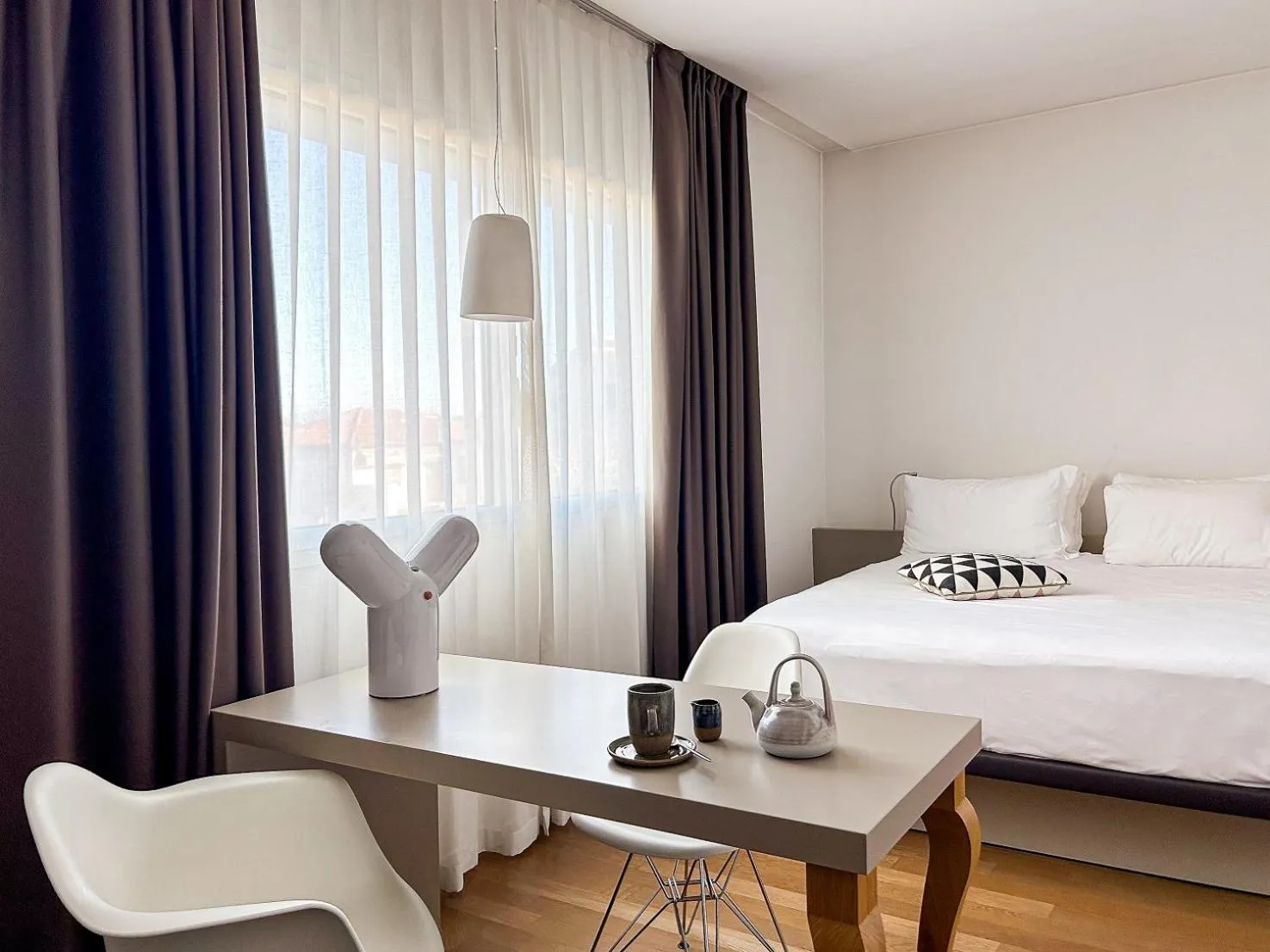 Seating area, Bed in Le Nove Hotel