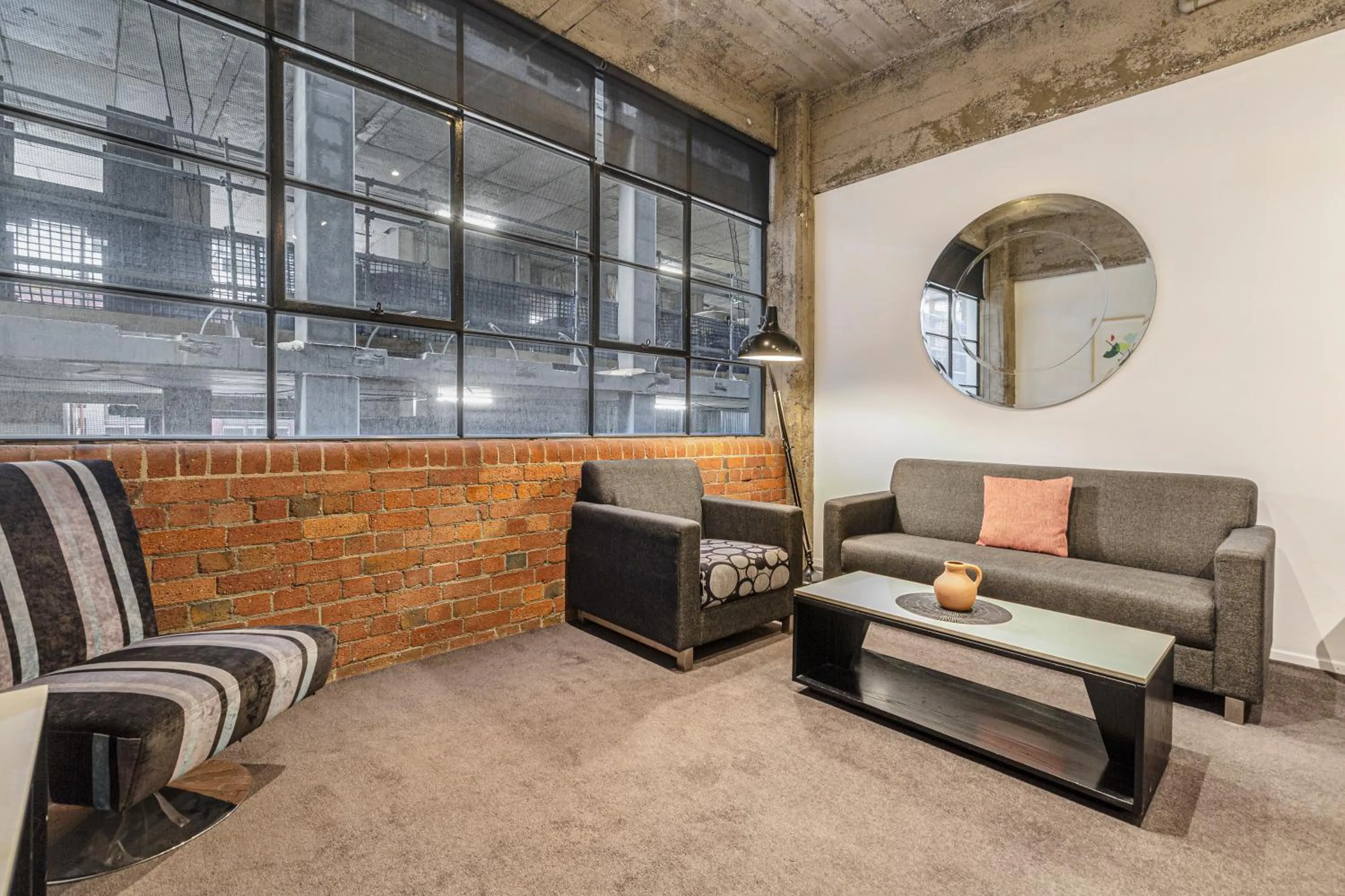 Living room in Punthill Apartment Hotel - Manhattan