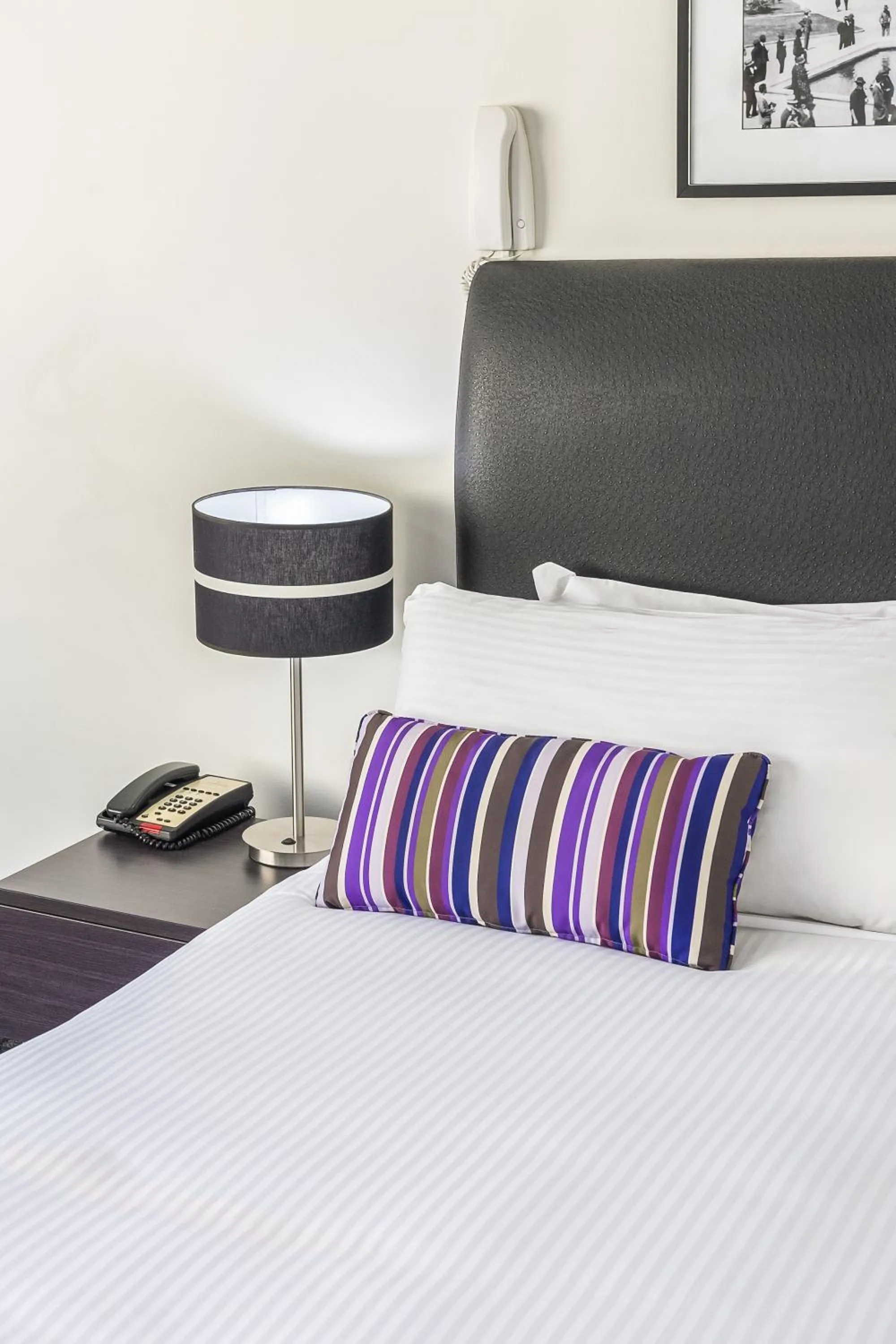 Bed in Oaks Sydney Hyde Park Suites