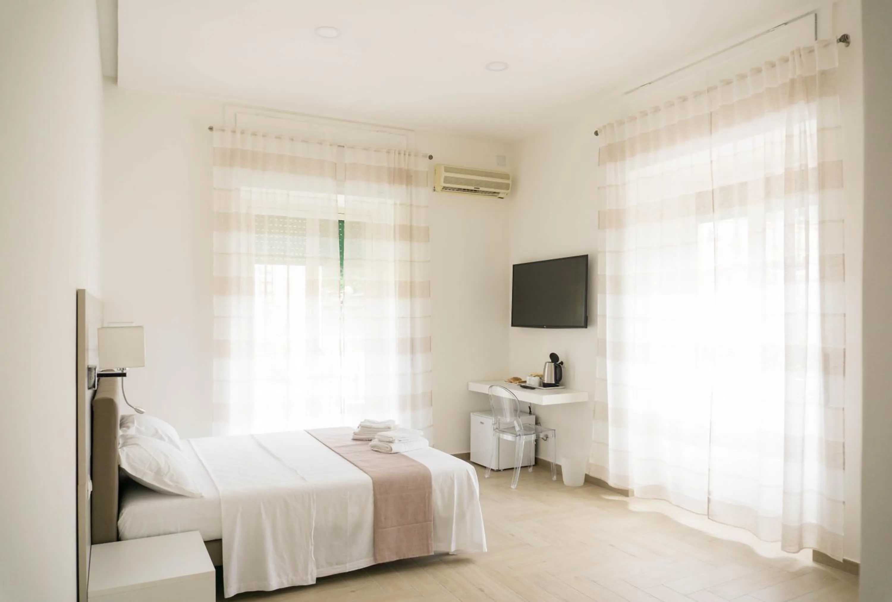 Staff, Bed in Le Stanze della Regina