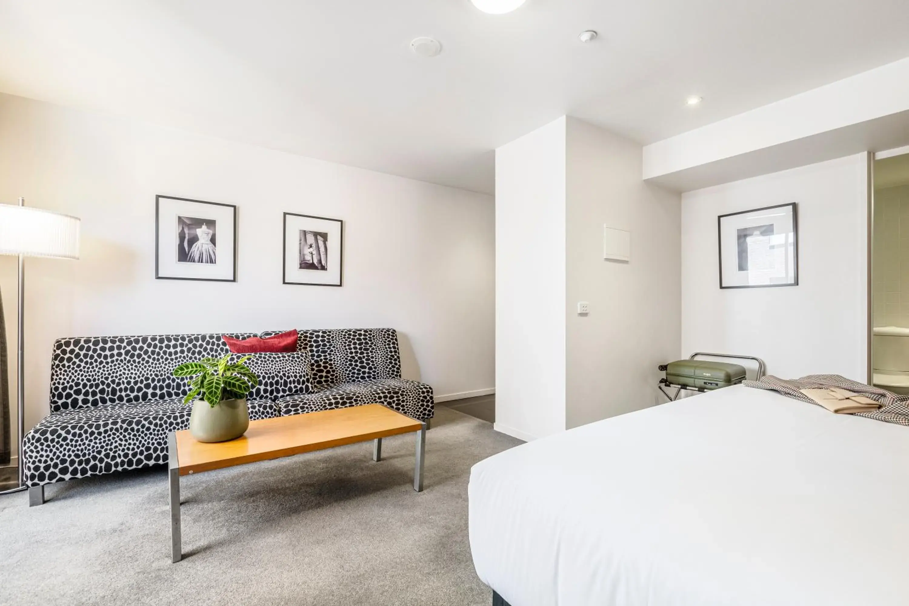 Living room, Bed in Punthill Apartment Hotel - Little Bourke Living room, Bed in Punthill Apartment Hotel - Little Bourke