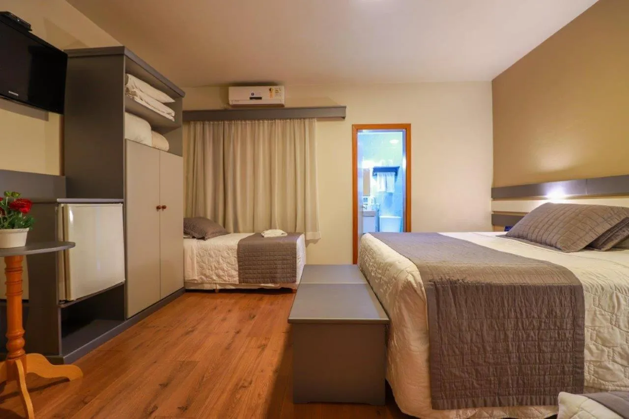 Luxury Quadruple Room in Hotel Bertoluci