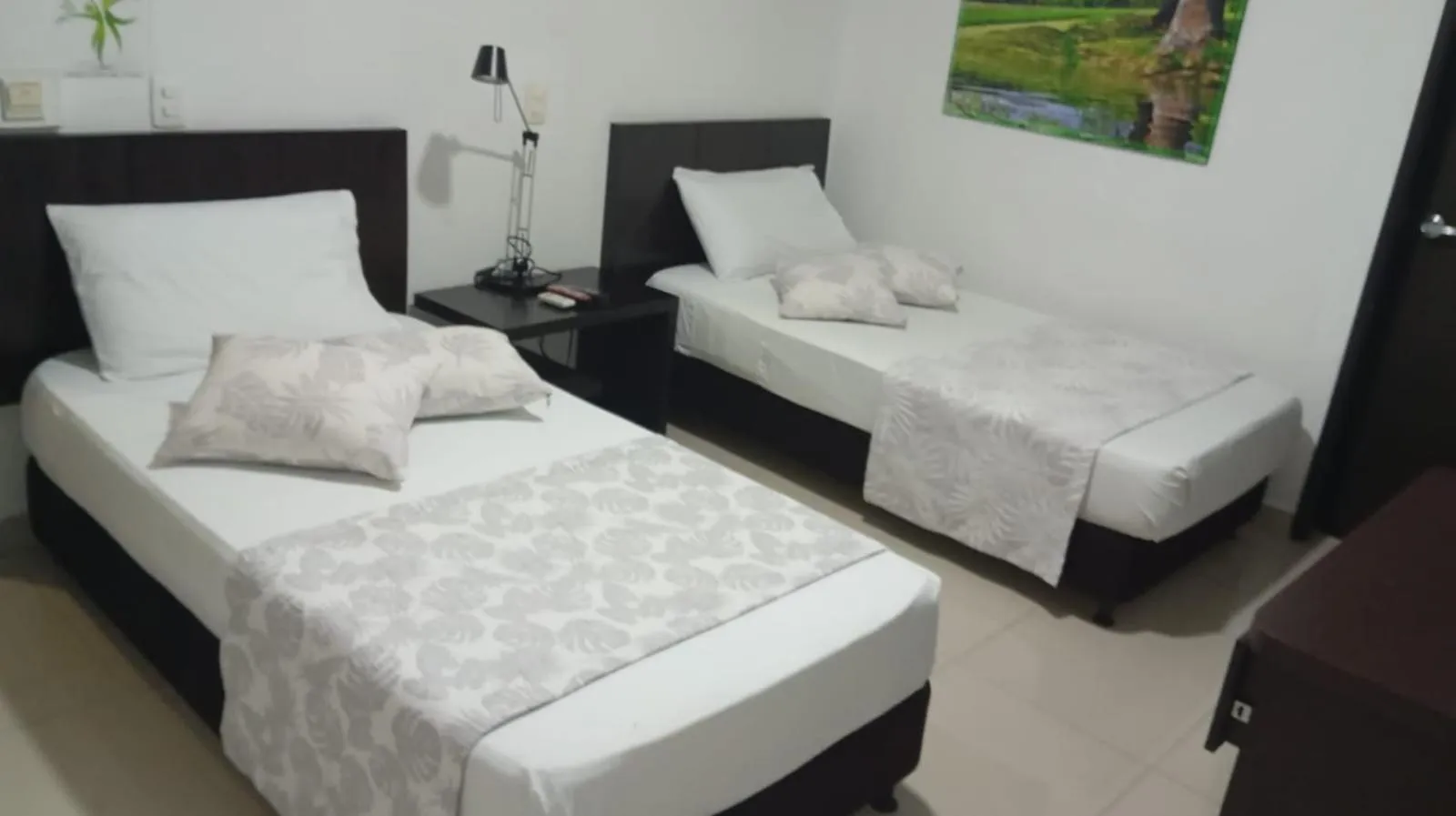 Photo of the whole room, Bed in hgo hotel