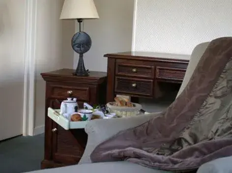 Photo of the whole room in Logis Hotel Les Sapins Photo of the whole room in Logis Hotel Les Sapins