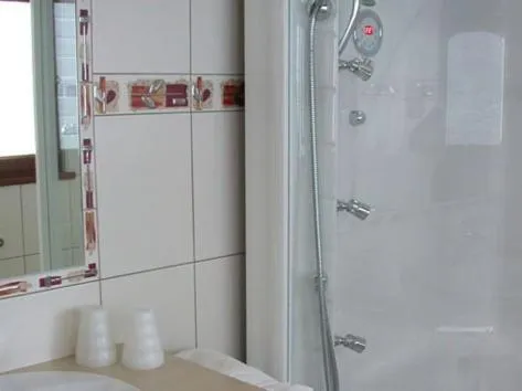 Bathroom in Logis Hotel Les Sapins