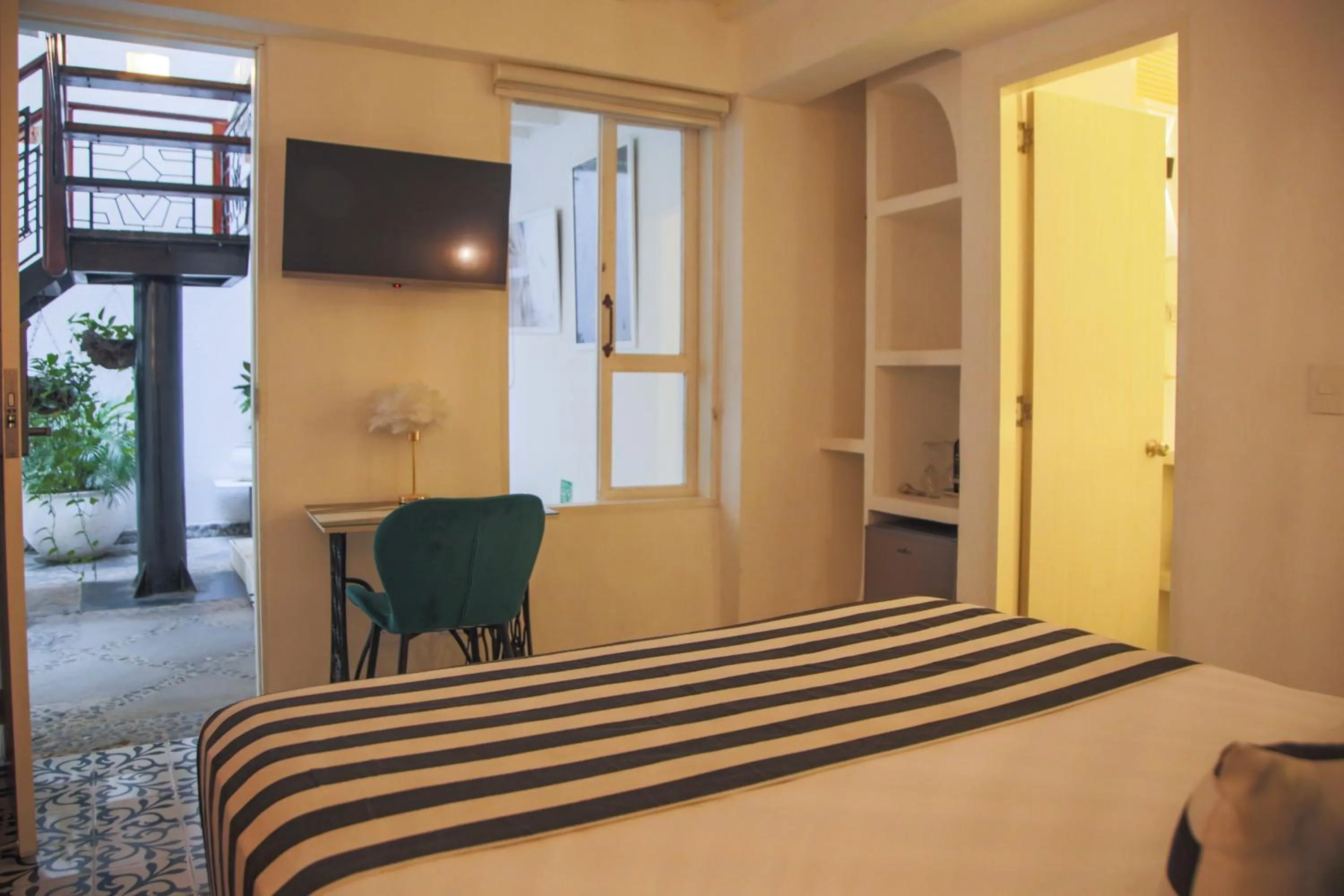 TV and multimedia, Bed in Casa Verde Boutique Hotel