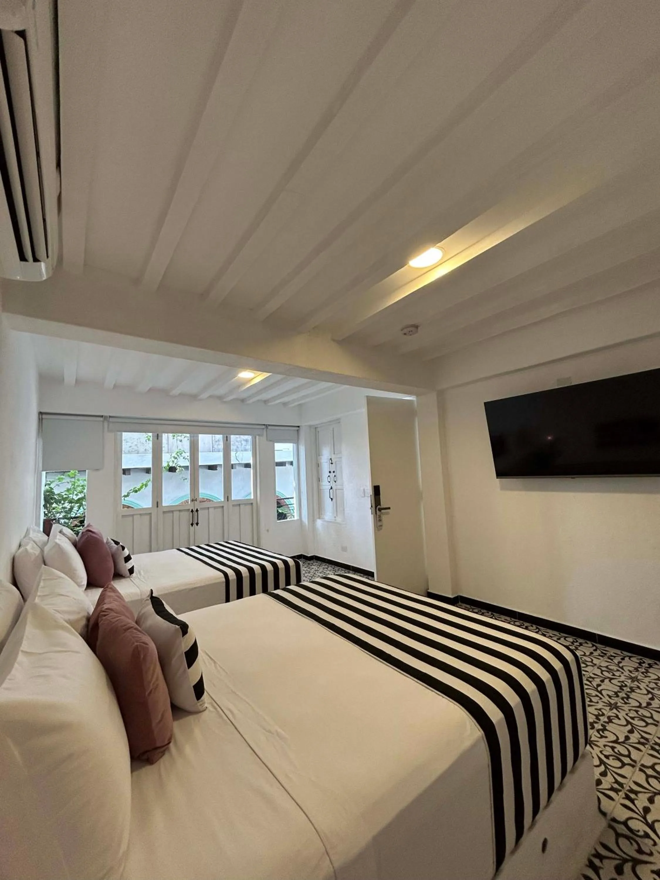 Bed in Casa Verde Boutique Hotel