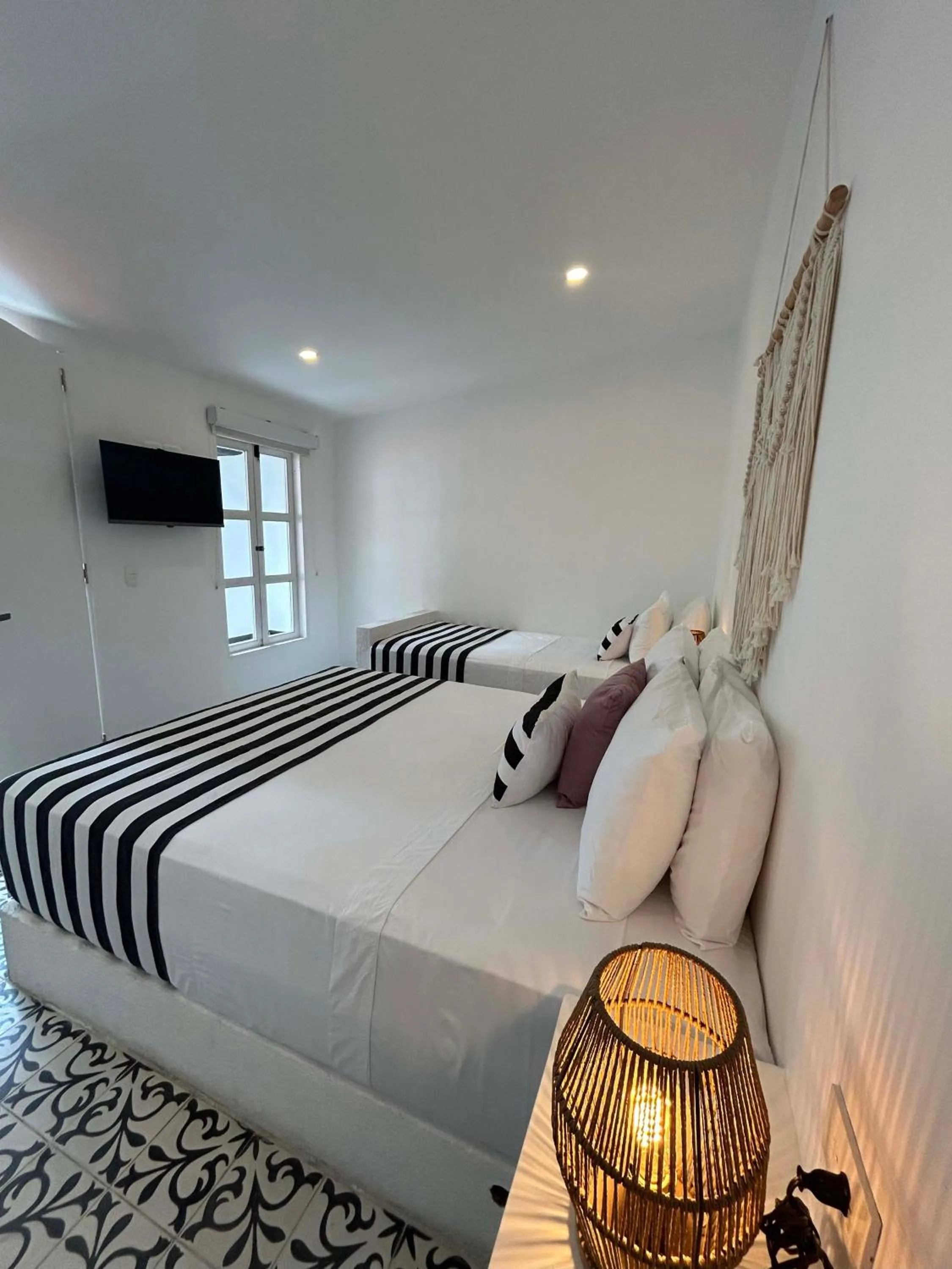 Bed in Casa Verde Boutique Hotel