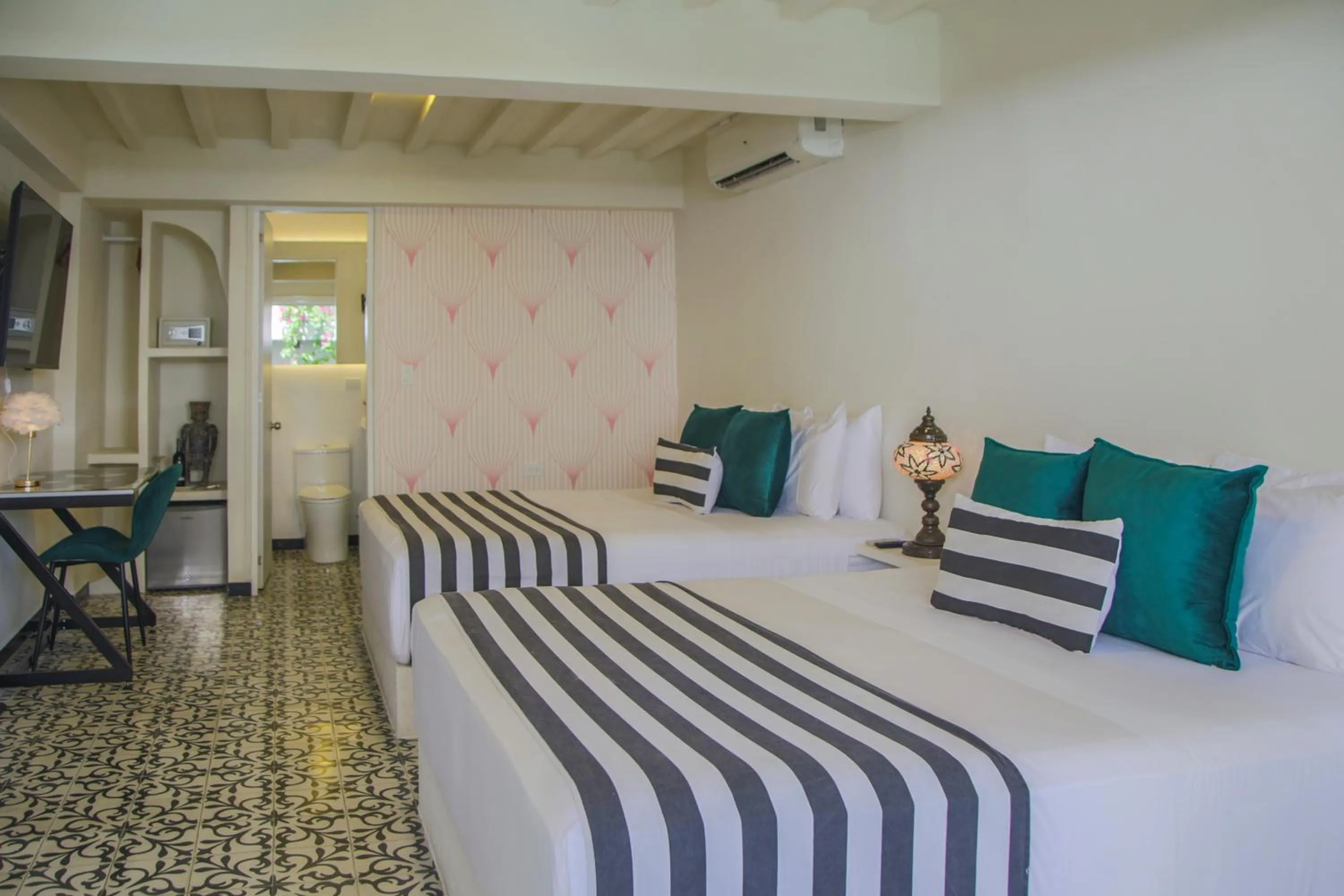 Bed in Casa Verde Boutique Hotel