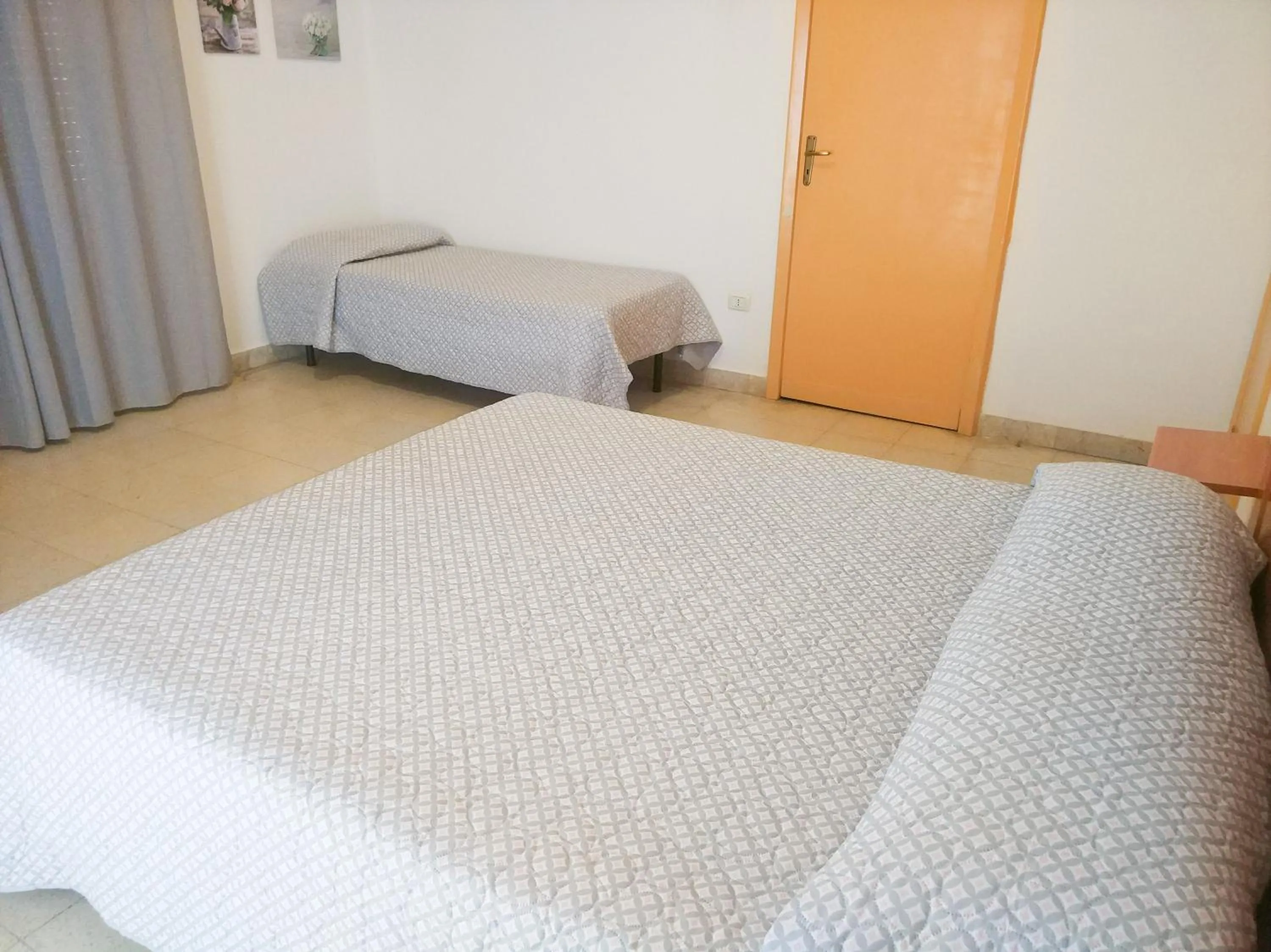Bed in Hotel Villa Souvenir