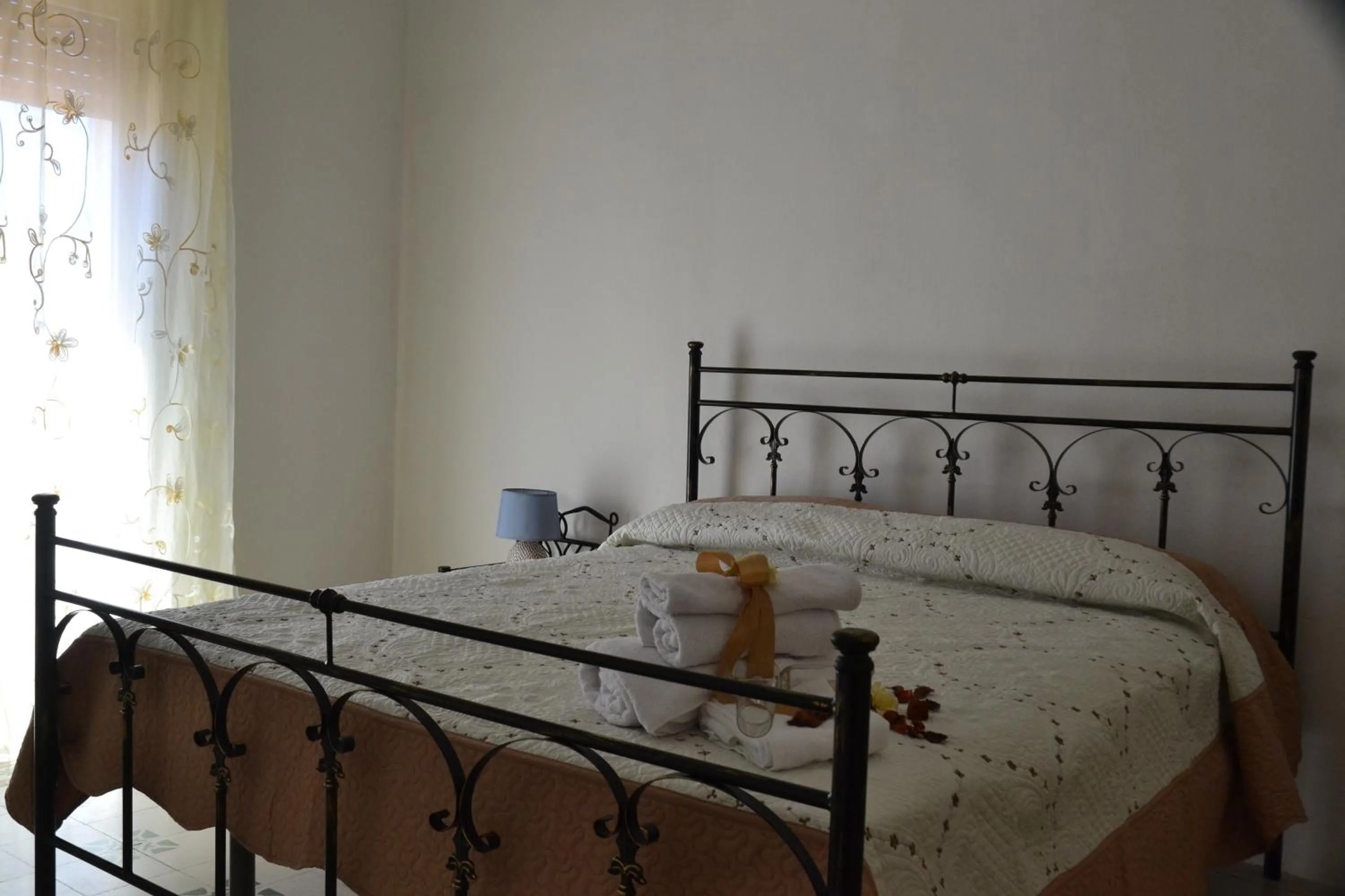 Bed in Gocce Siciliane Apartments
