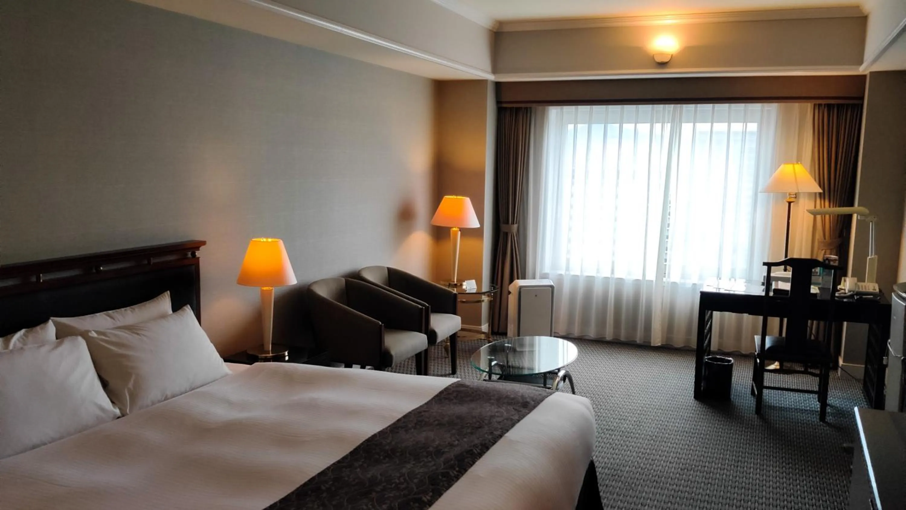 Bed in Kurashiki Royal Art Hotel