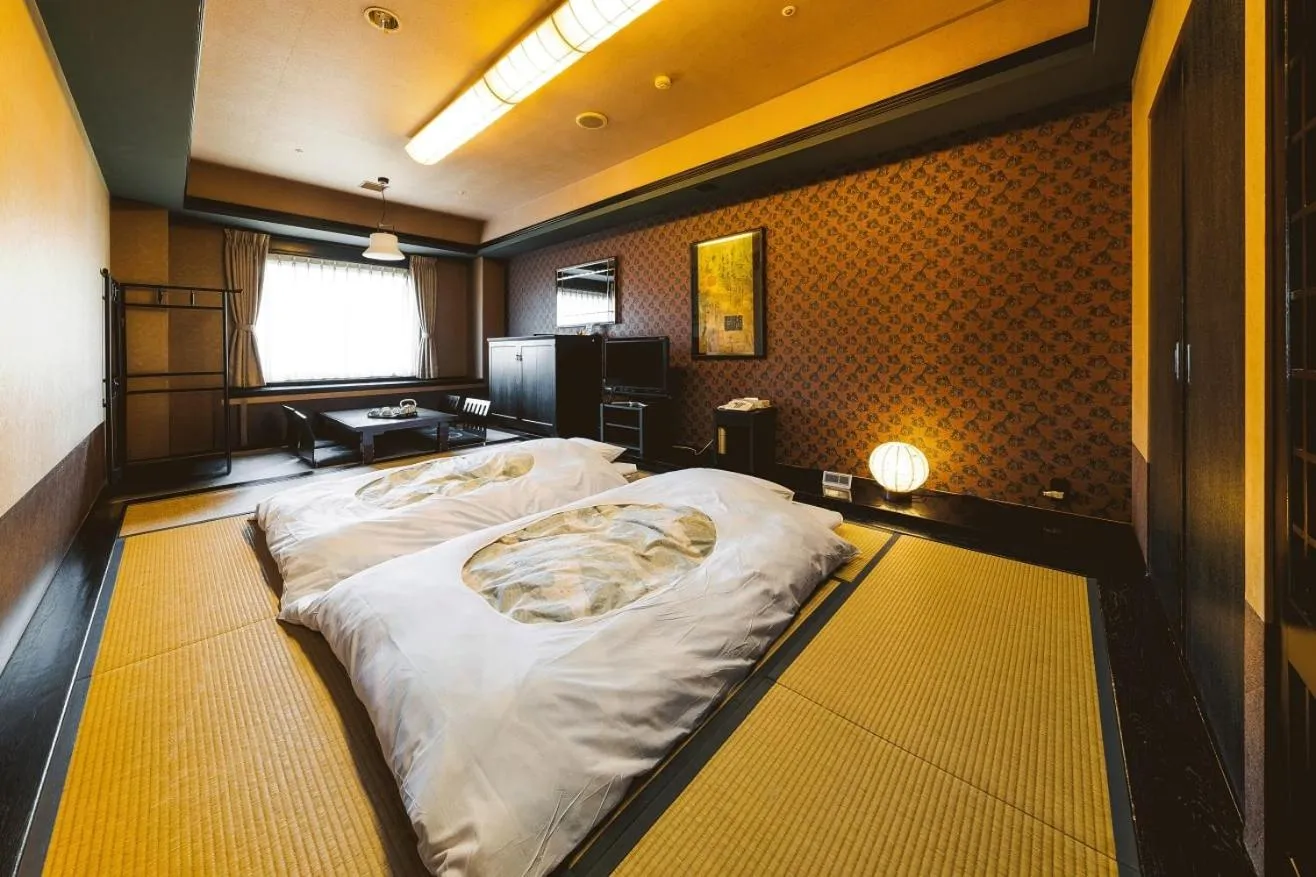 Bed in Kurashiki Royal Art Hotel