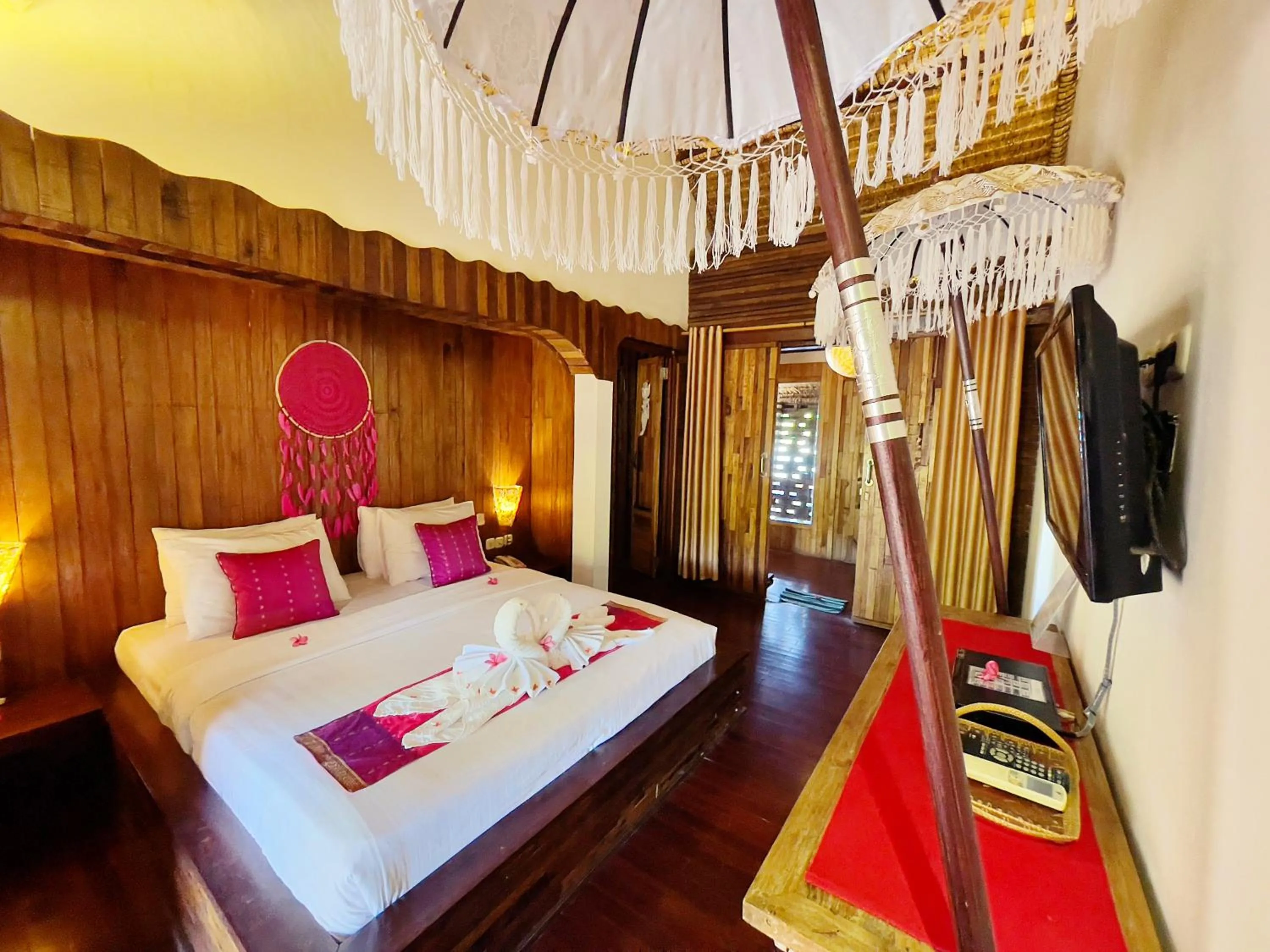 Bed in Samba Villas Beachfront View