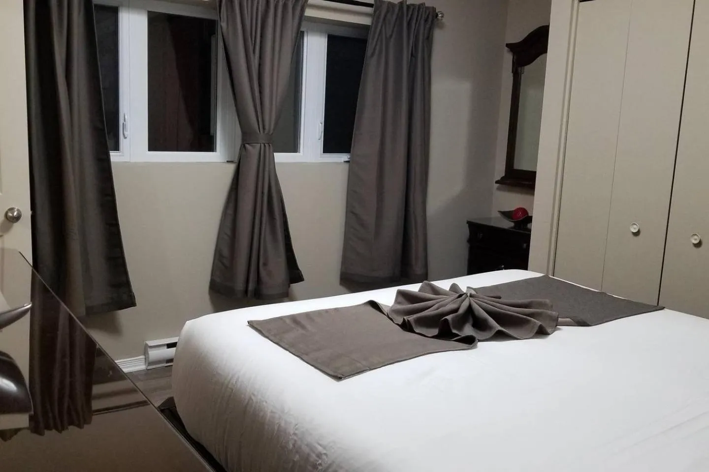 Bed in Sweet 2-Bedroom Penthouse Apartment by Amazing Property Rentals