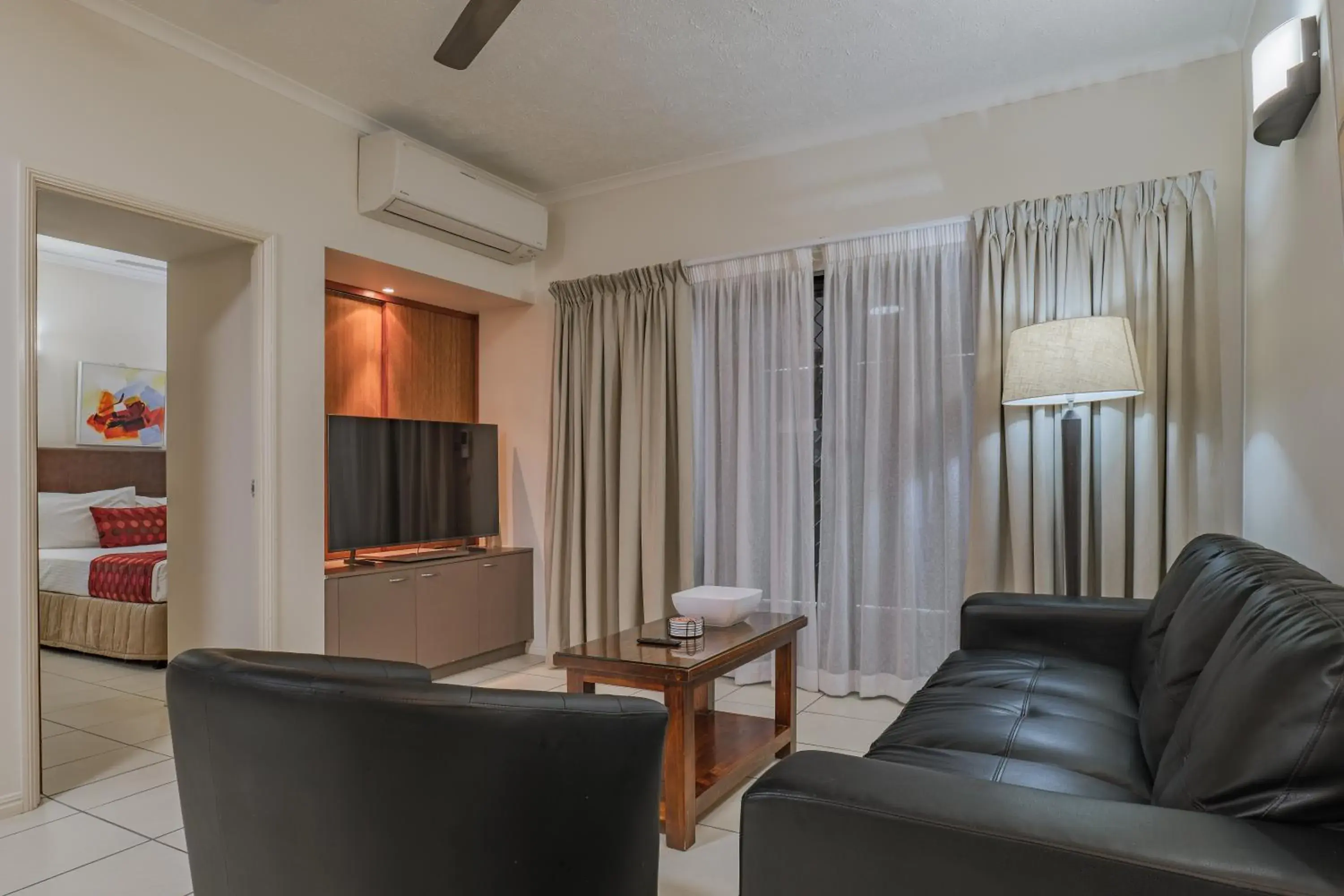 Living room in Southern Cross Atrium Apartments Living room in Southern Cross Atrium Apartments