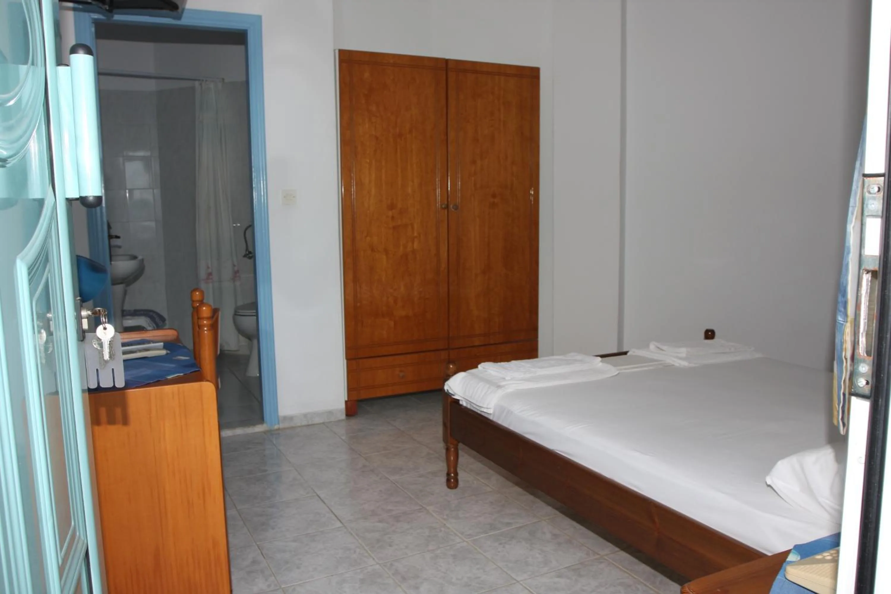 Photo of the whole room, Bed in Akrogiali Hotel