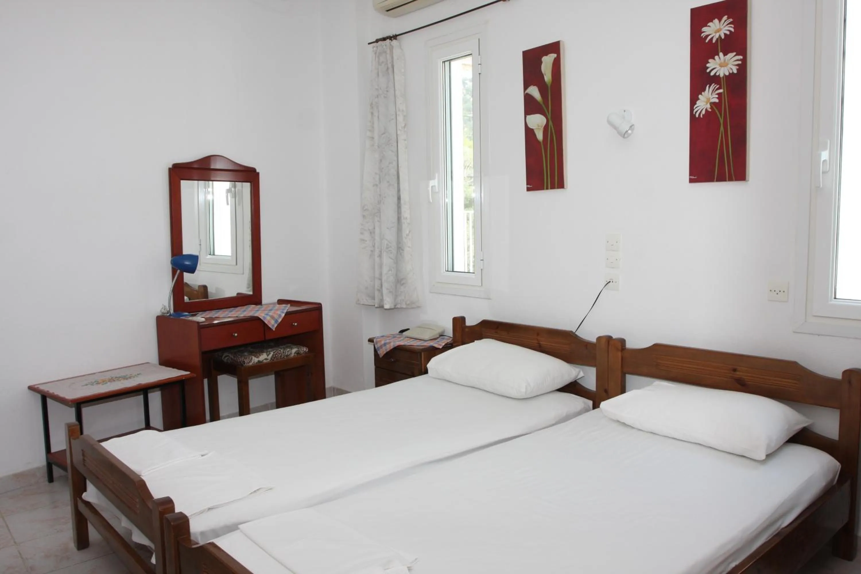 Photo of the whole room, Bed in Akrogiali Hotel