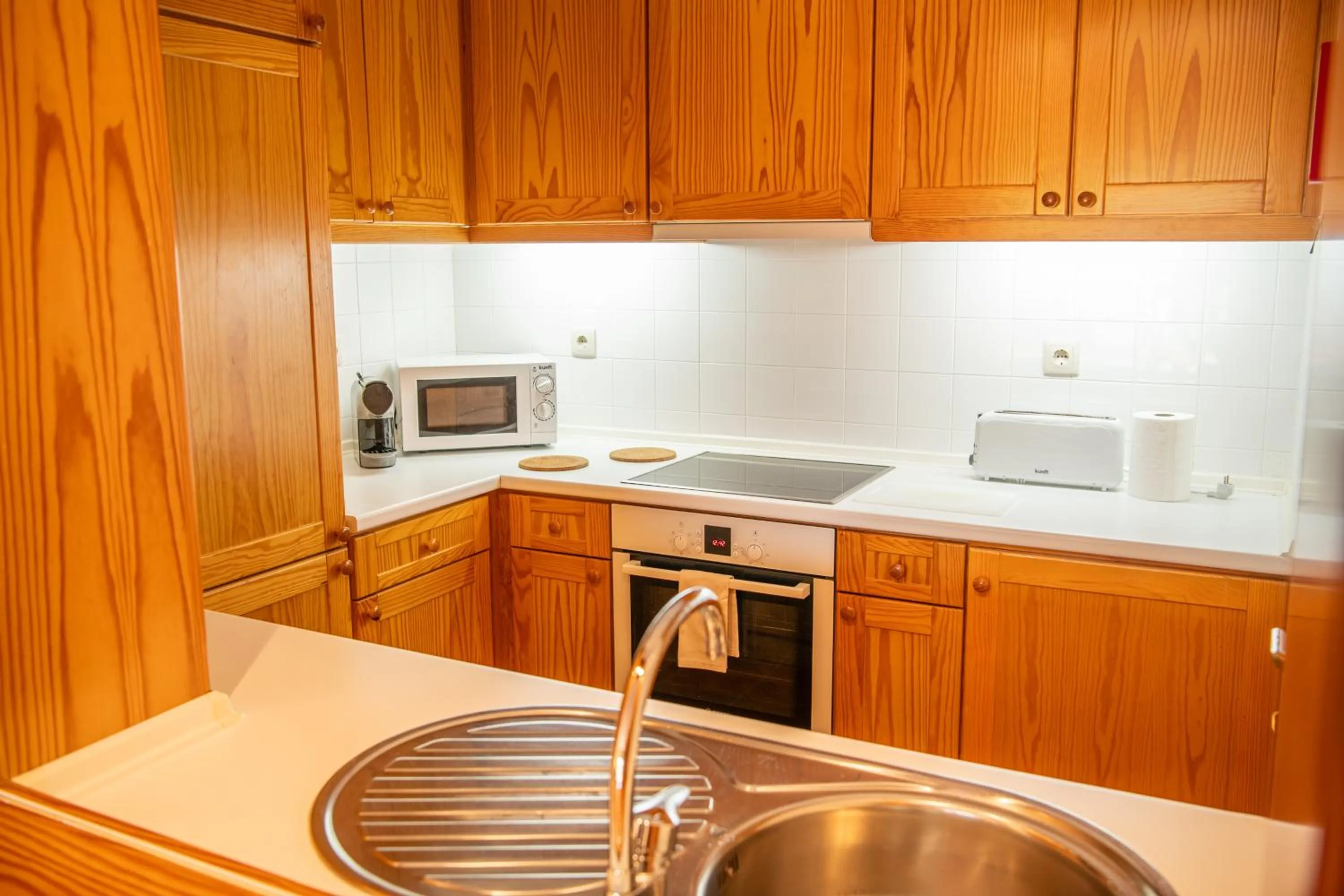 kitchen in Apartamentos do Lago