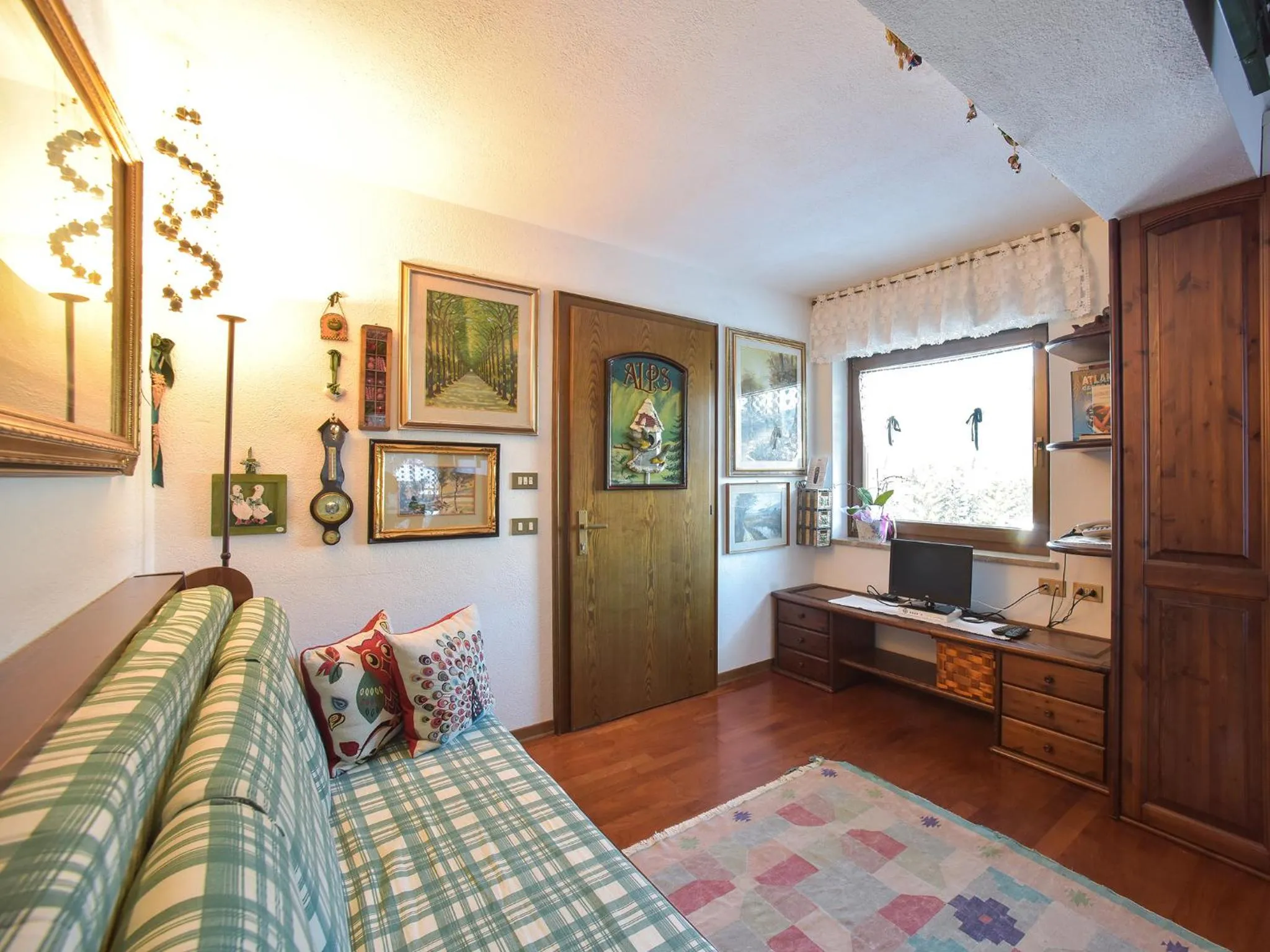 Living room, Bed in Residence Salvan