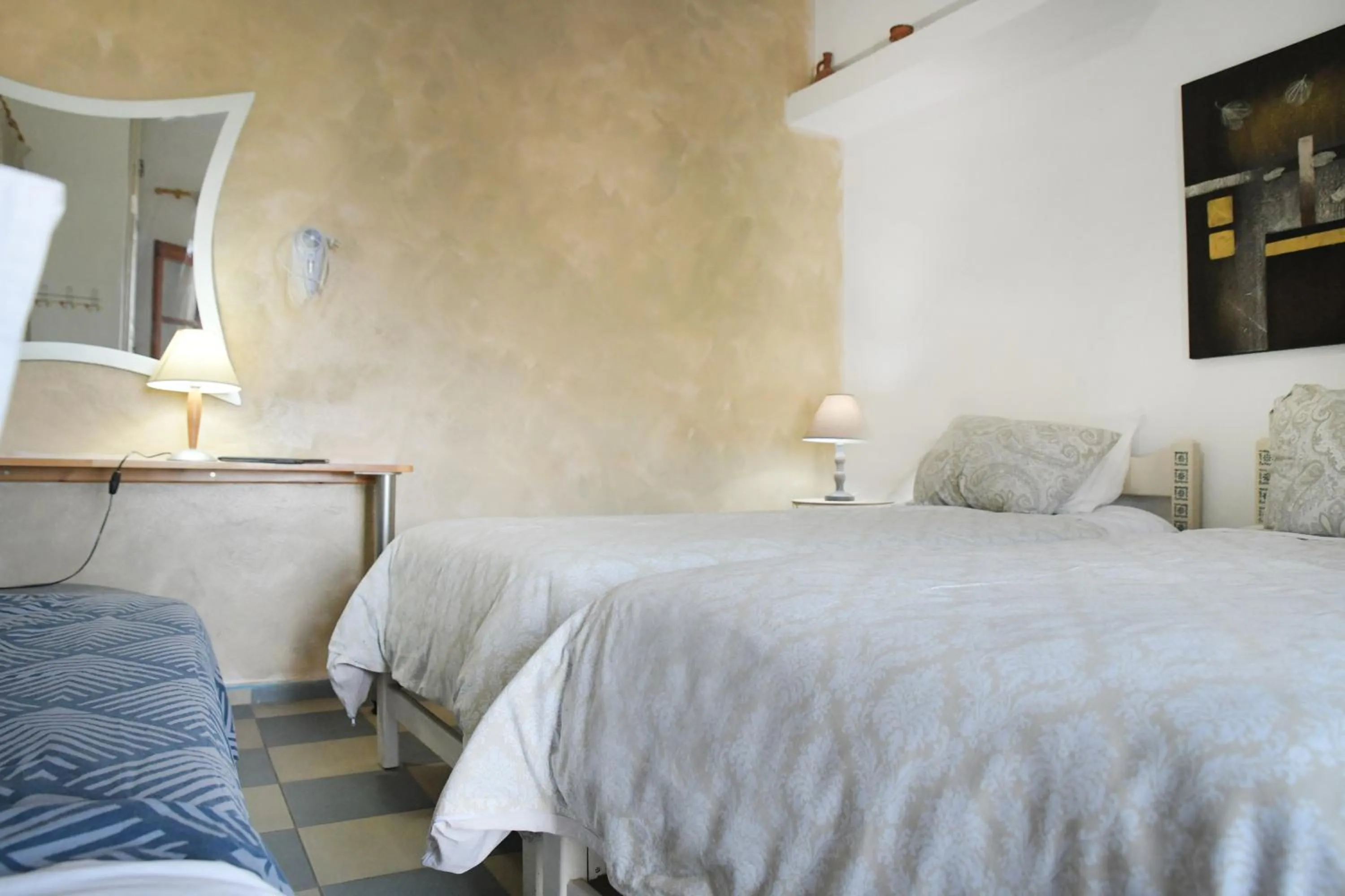 Bed in Panorama Studios & Apartments