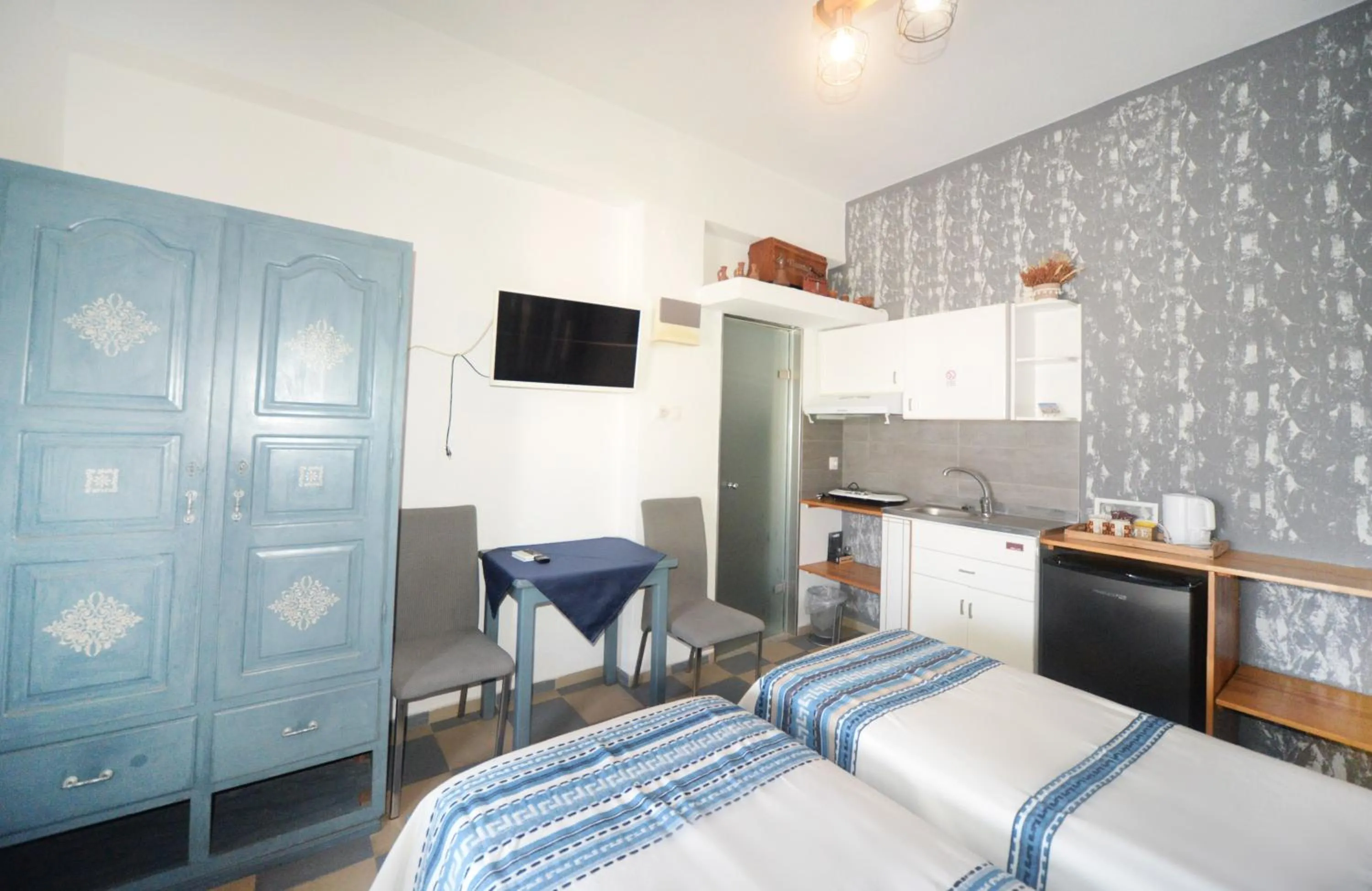 Bed in Panorama Studios & Apartments