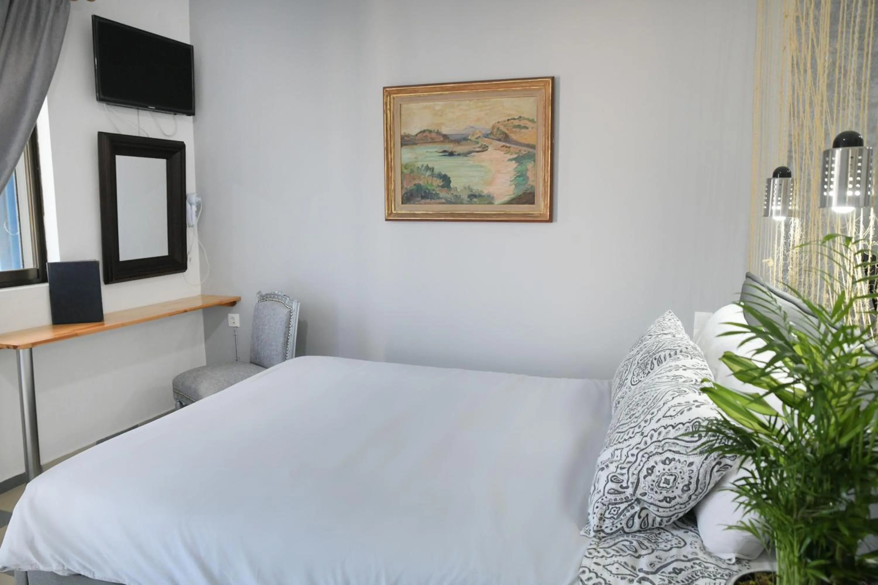 Bed in Panorama Studios & Apartments