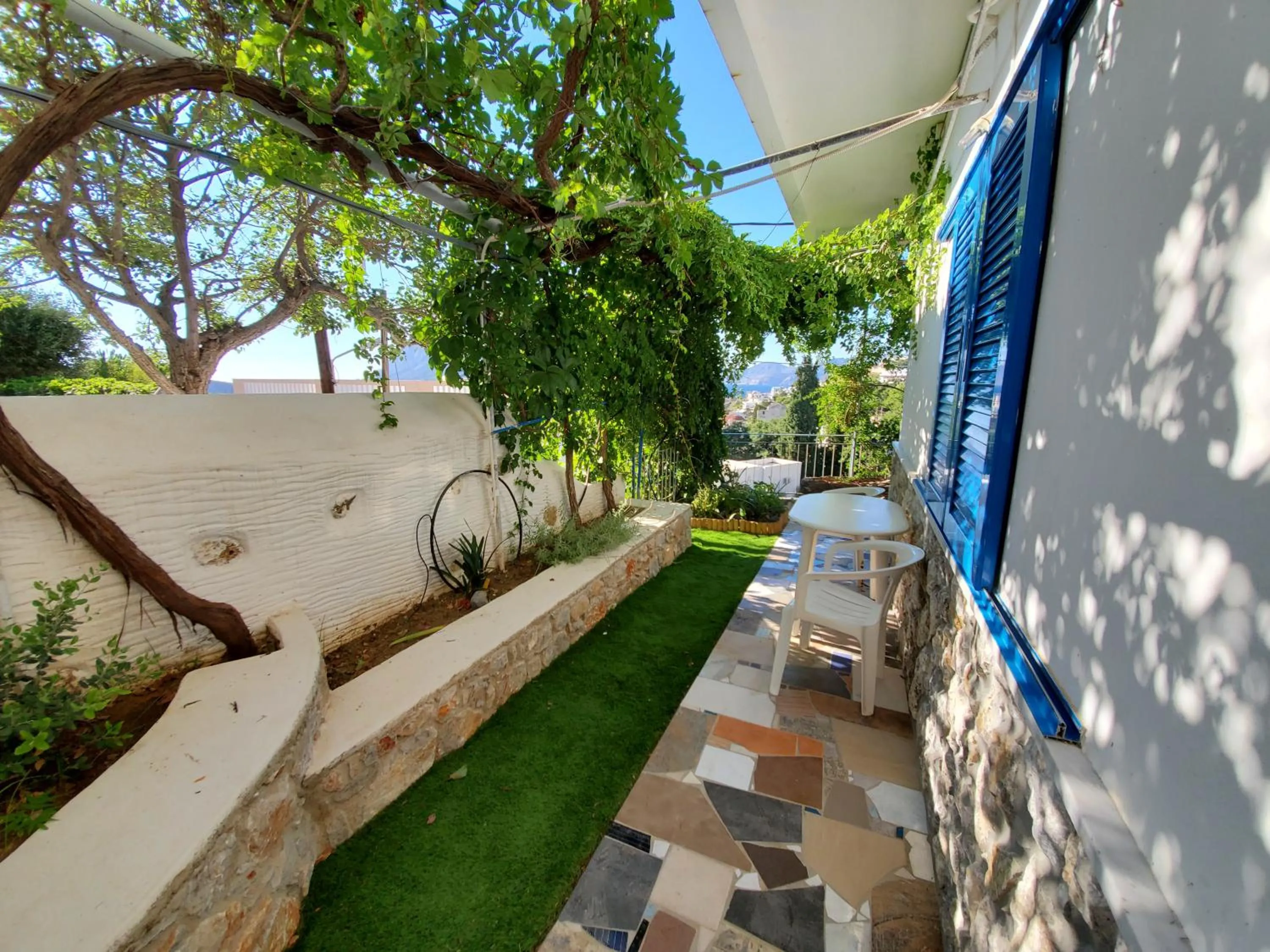Garden view in Panorama Studios & Apartments
