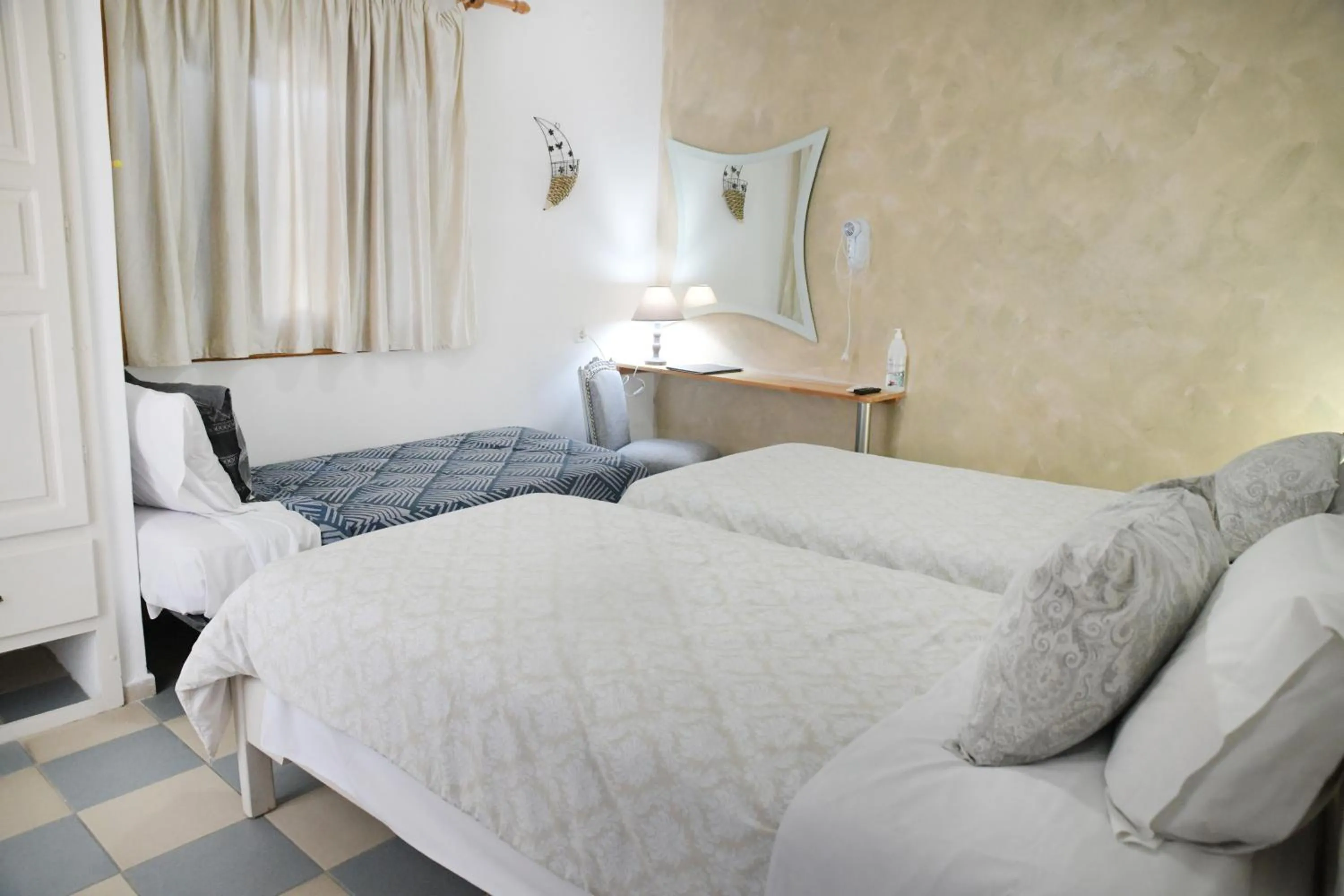 Bed in Panorama Studios & Apartments
