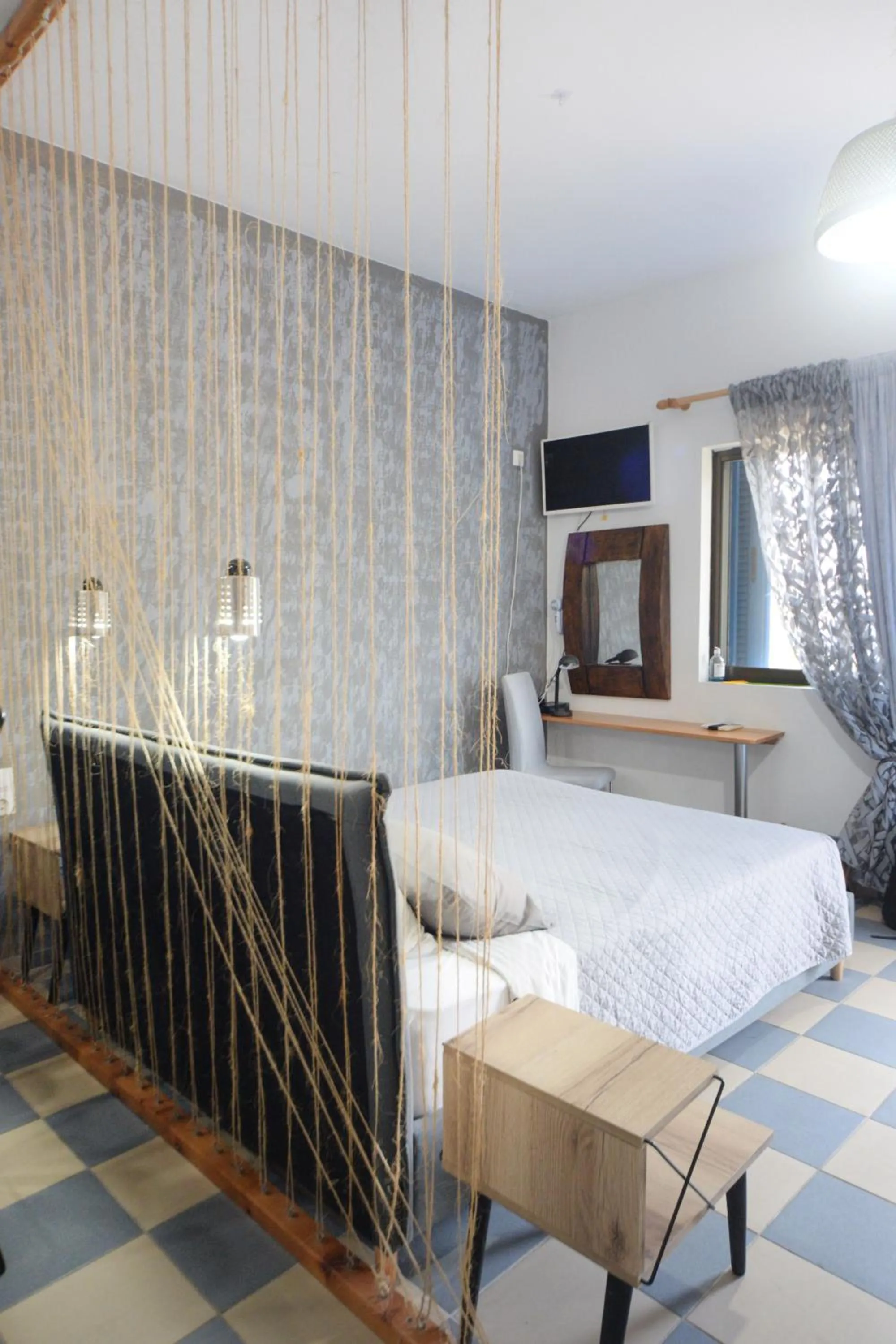 Bed in Panorama Studios & Apartments