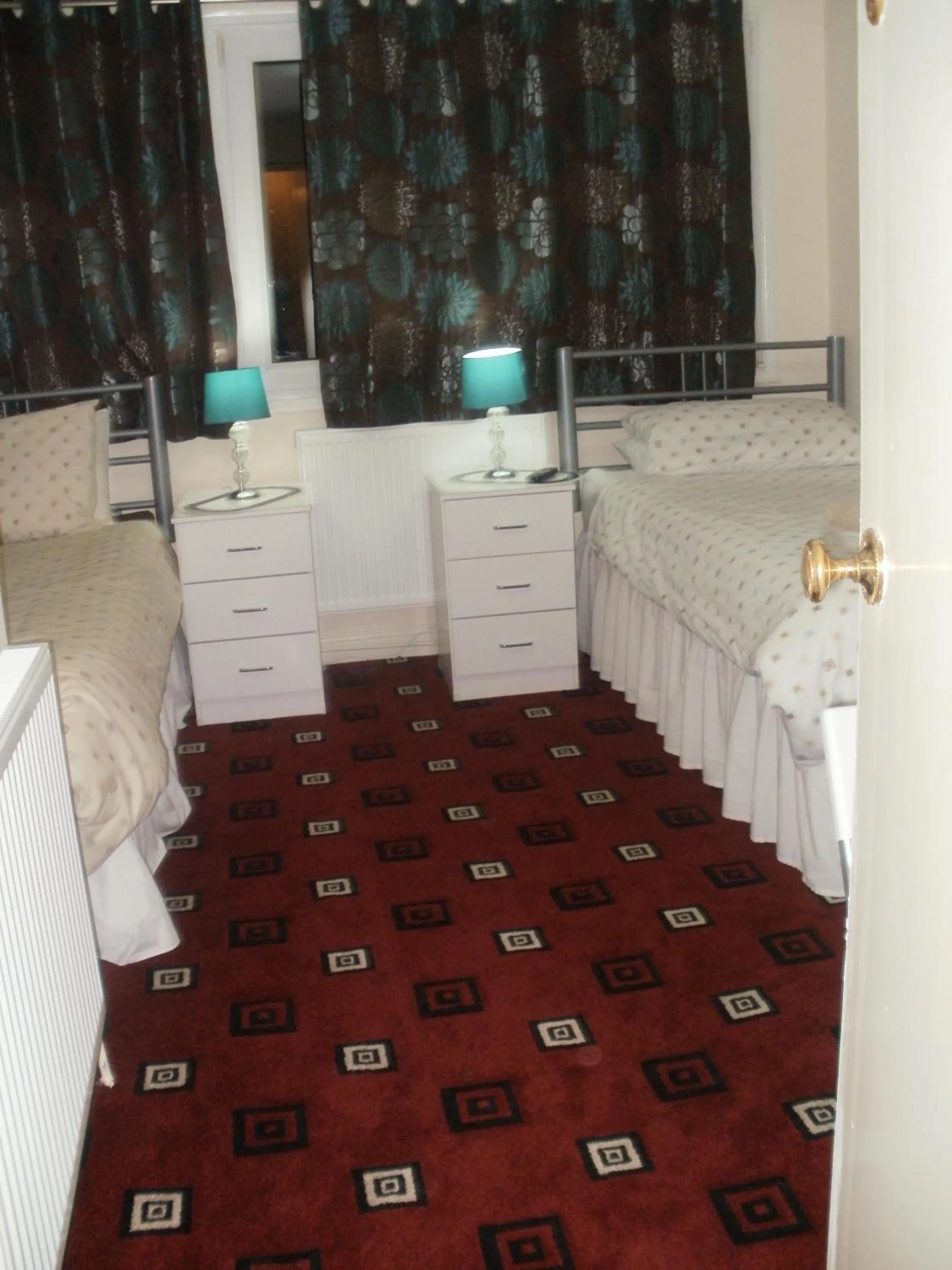 Decorative detail, Bed in London Heathrow Guesthouse