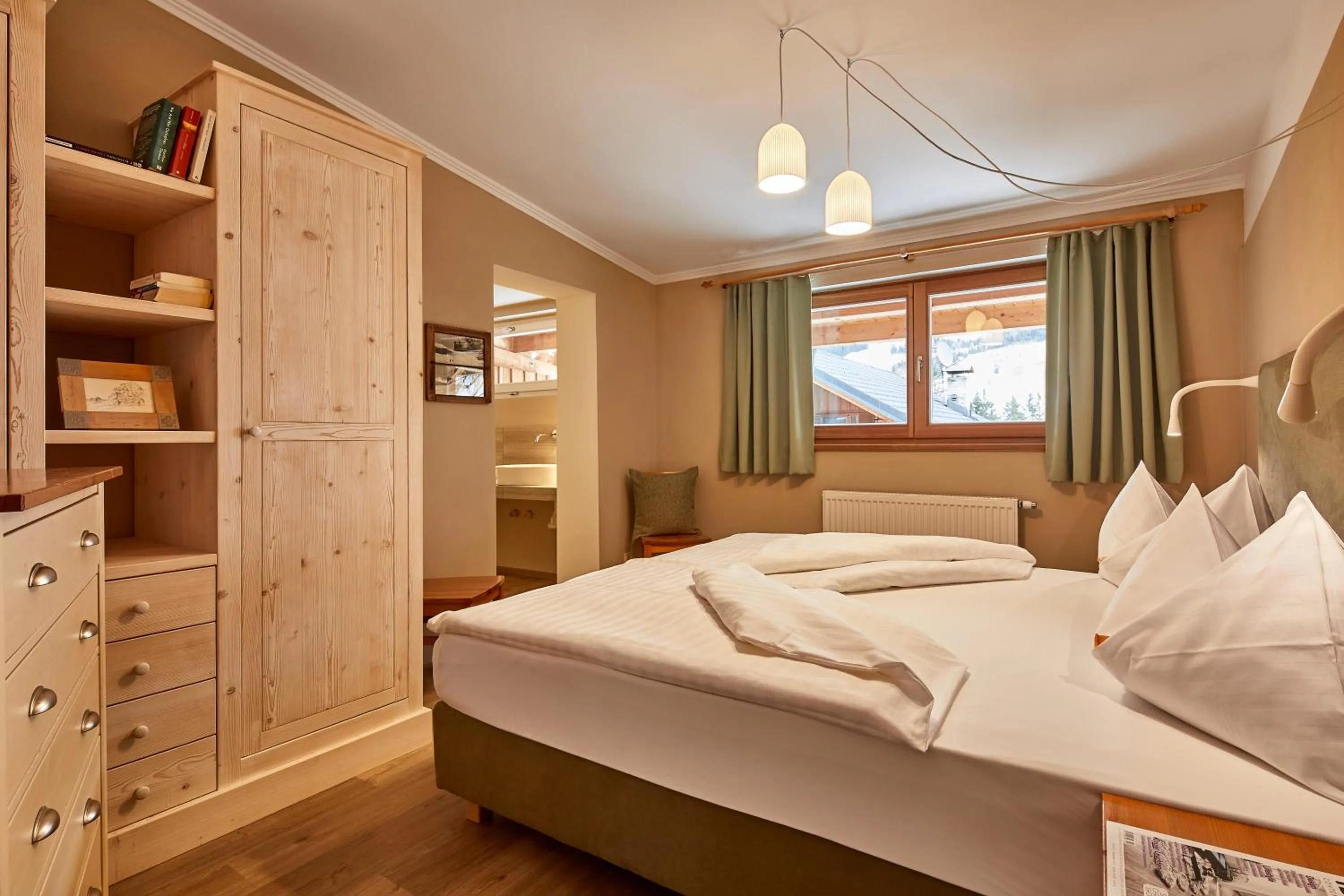 Bed in Appartamenti La Sajun & Les Viles