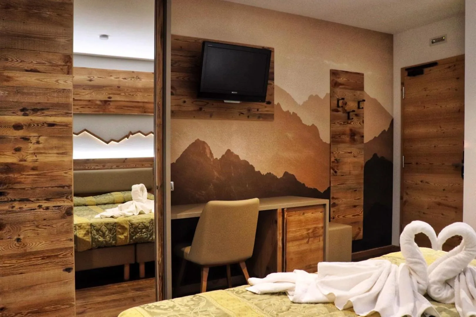 Bed in Hotel Panorama Wellness & Resort