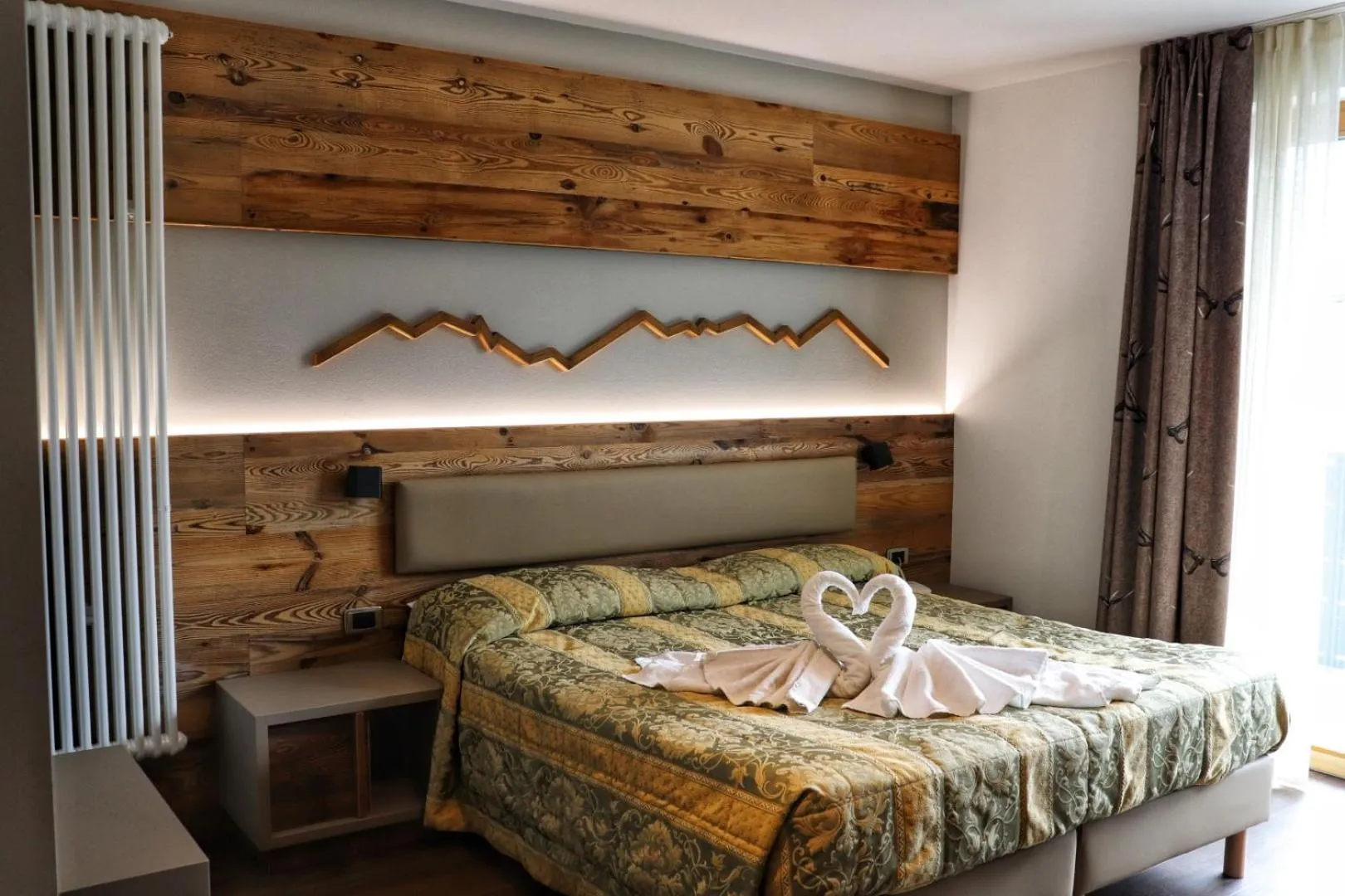 Bed in Hotel Panorama Wellness & Resort