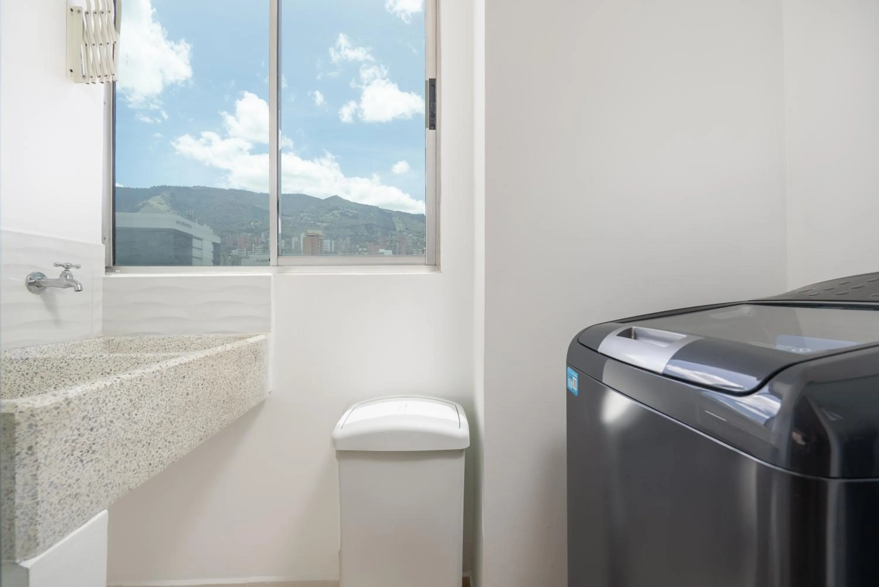 washing machine in Affinity ApartaHotel - Extended Stay