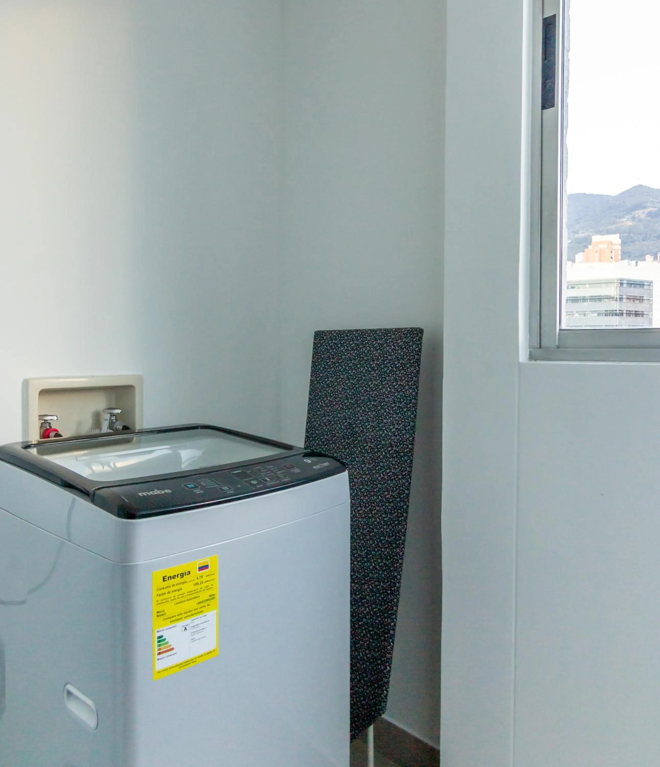 washing machine in Affinity ApartaHotel - Extended Stay