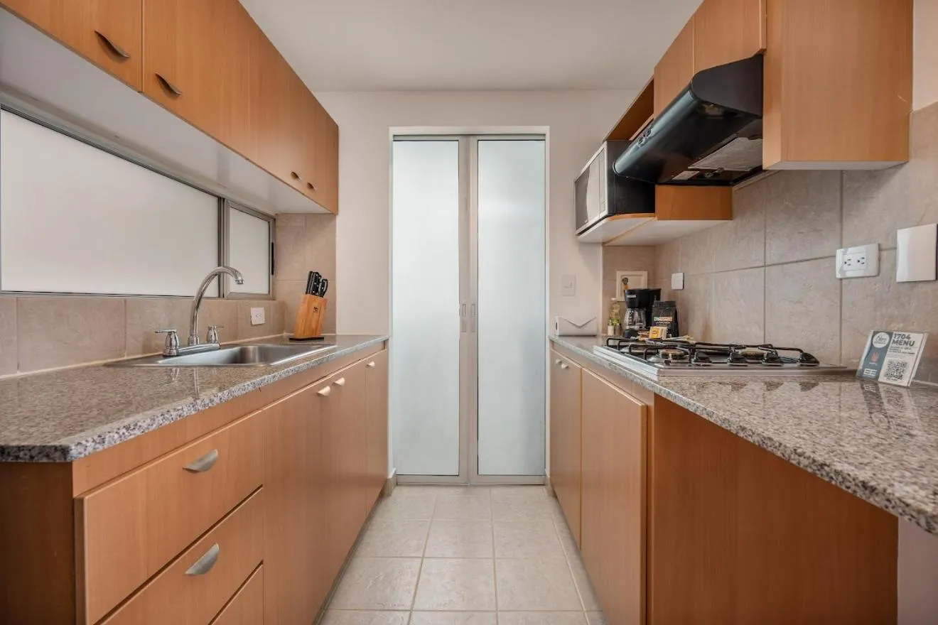 Kitchen or kitchenette in Affinity ApartaHotel - Extended Stay