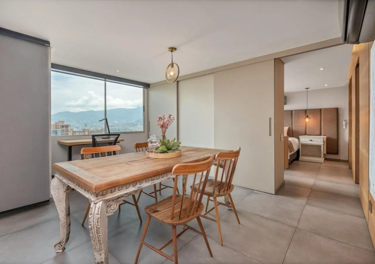 Dining area, Bed in Affinity ApartaHotel - Extended Stay