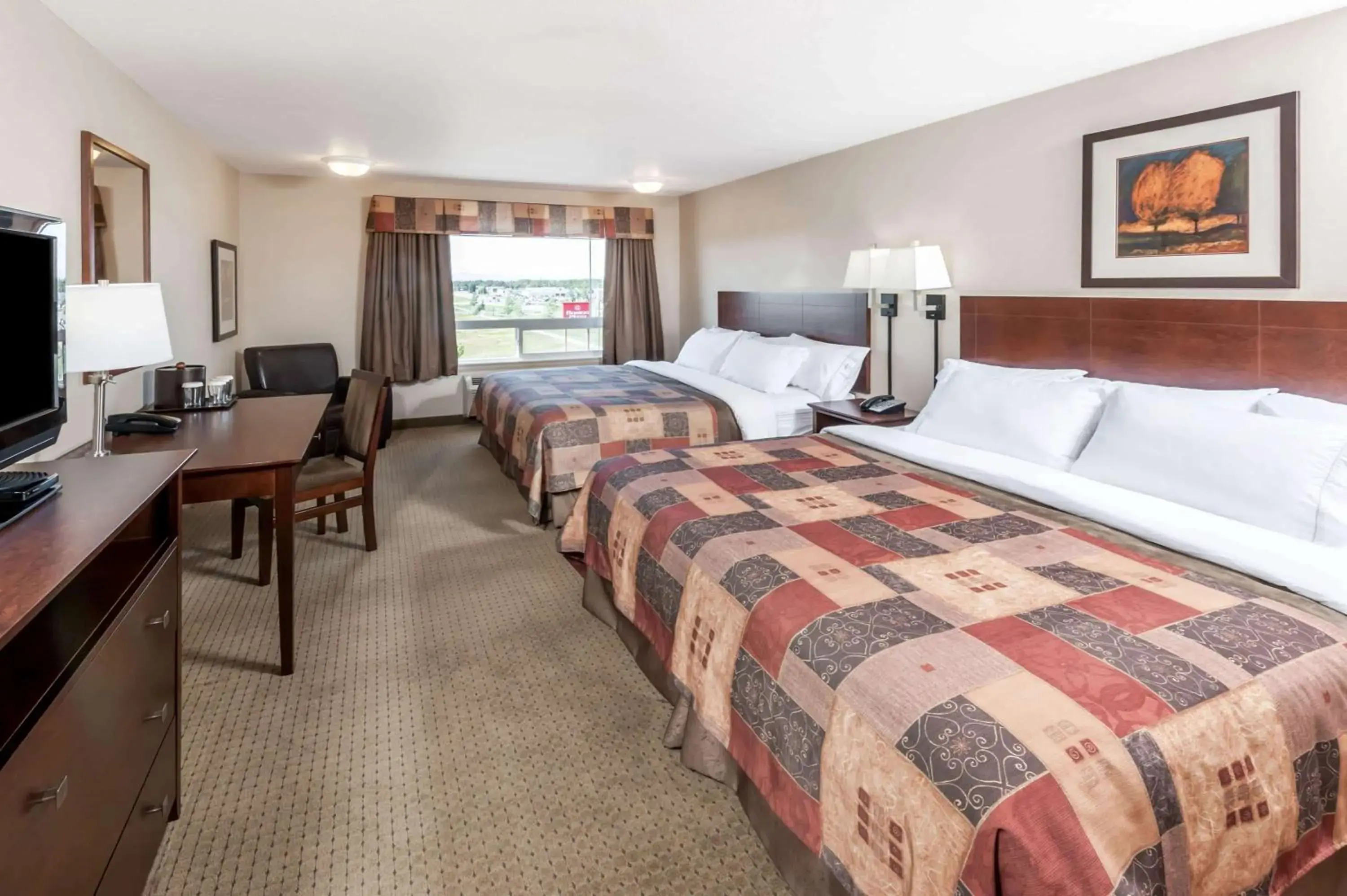 Photo of the whole room in Ramada by Wyndham High River Photo of the whole room in Ramada by Wyndham High River