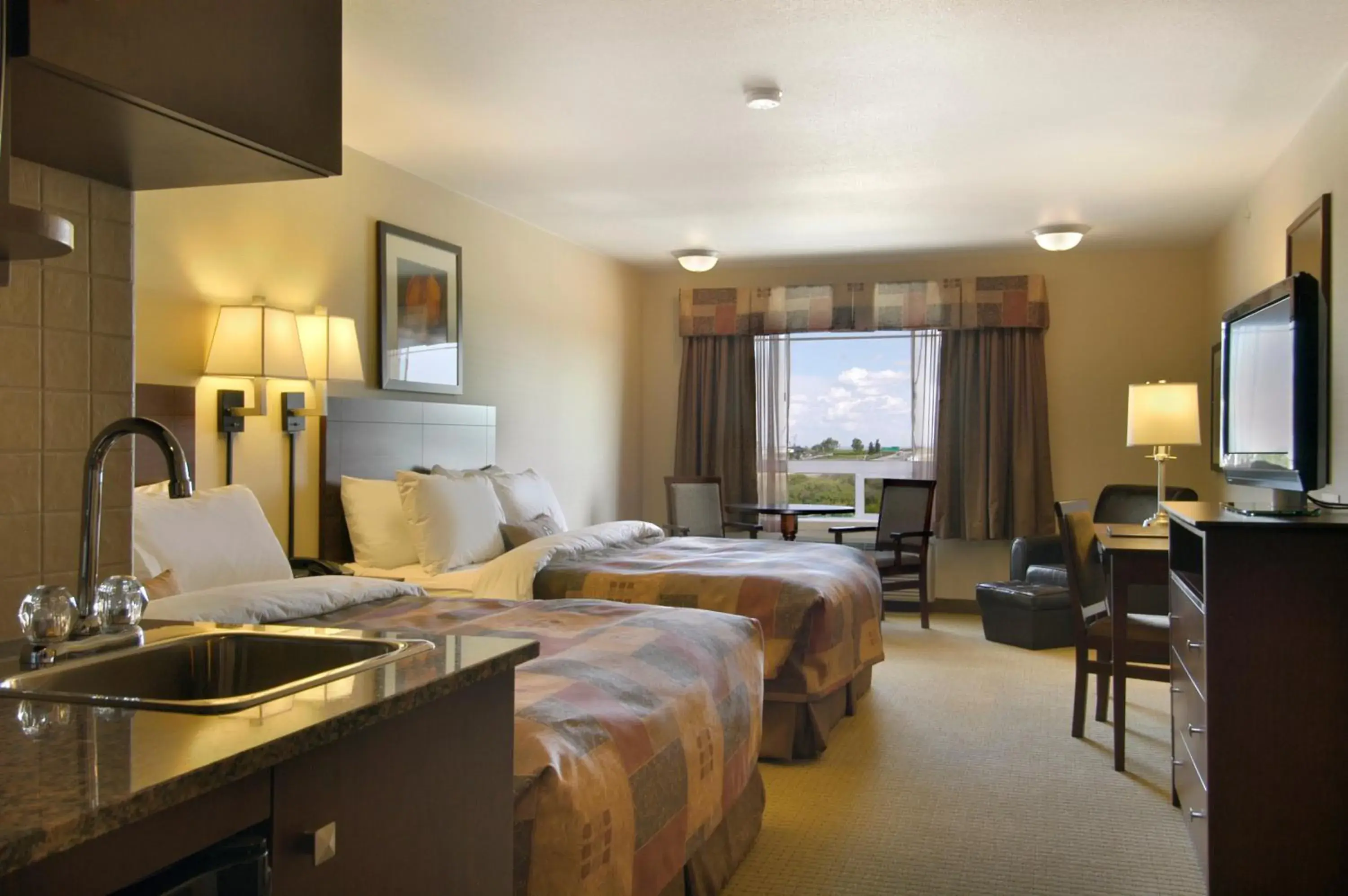 Photo of the whole room in Ramada by Wyndham High River Photo of the whole room in Ramada by Wyndham High River