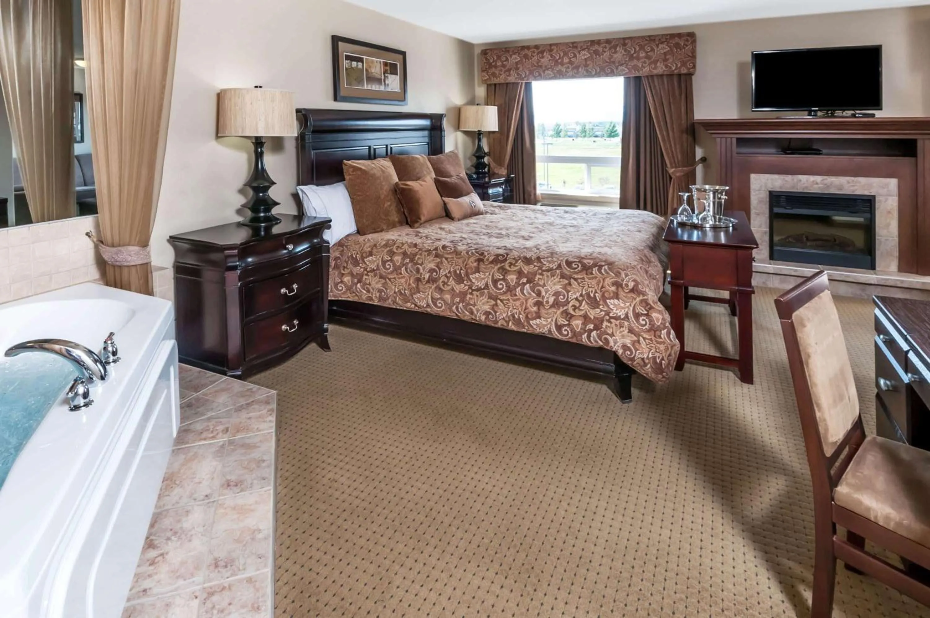 Photo of the whole room in Ramada by Wyndham High River