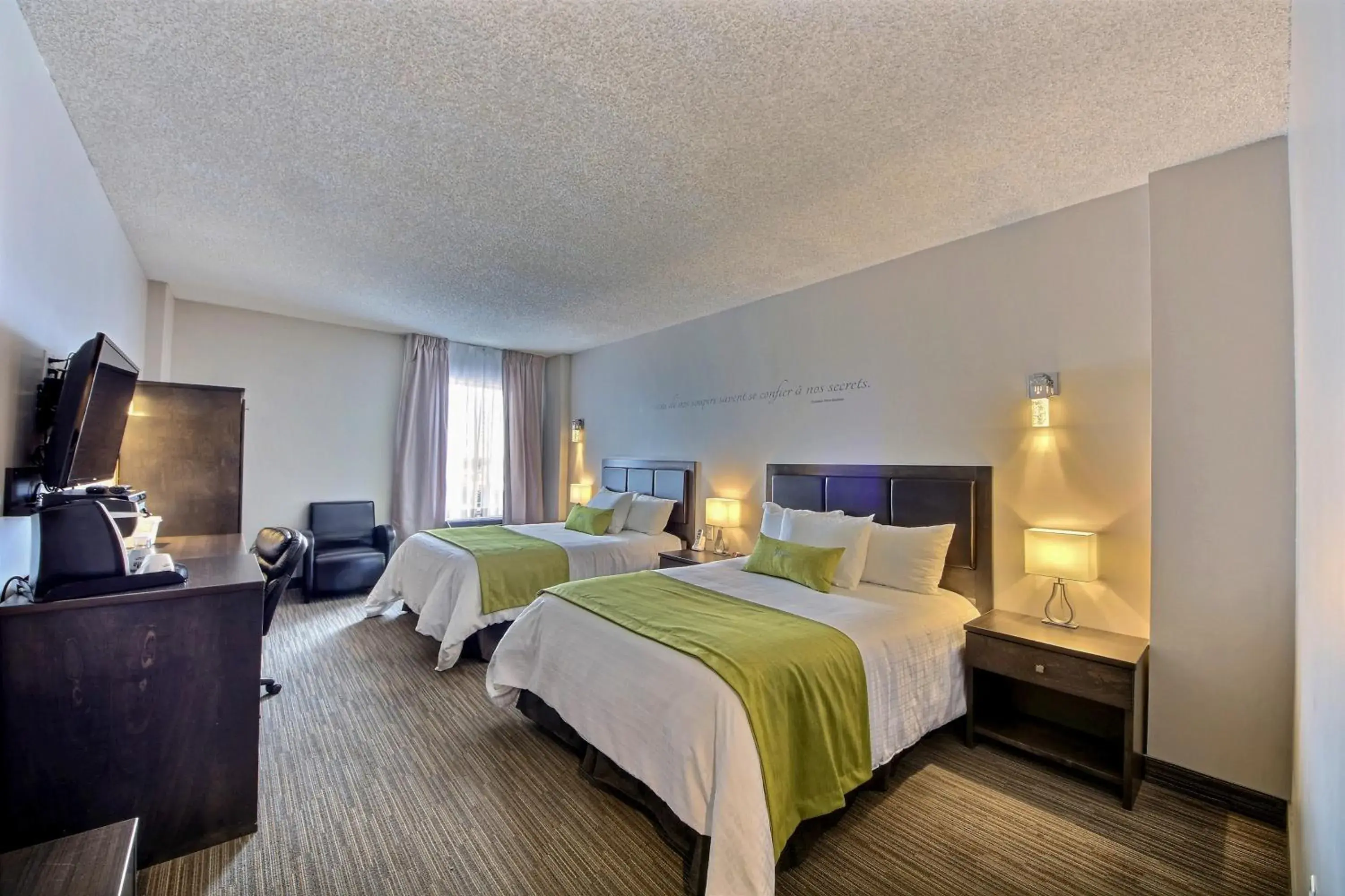 Double Room with Two Double Beds in Hôtel du Jardin Double Room with Two Double Beds in Hôtel du Jardin