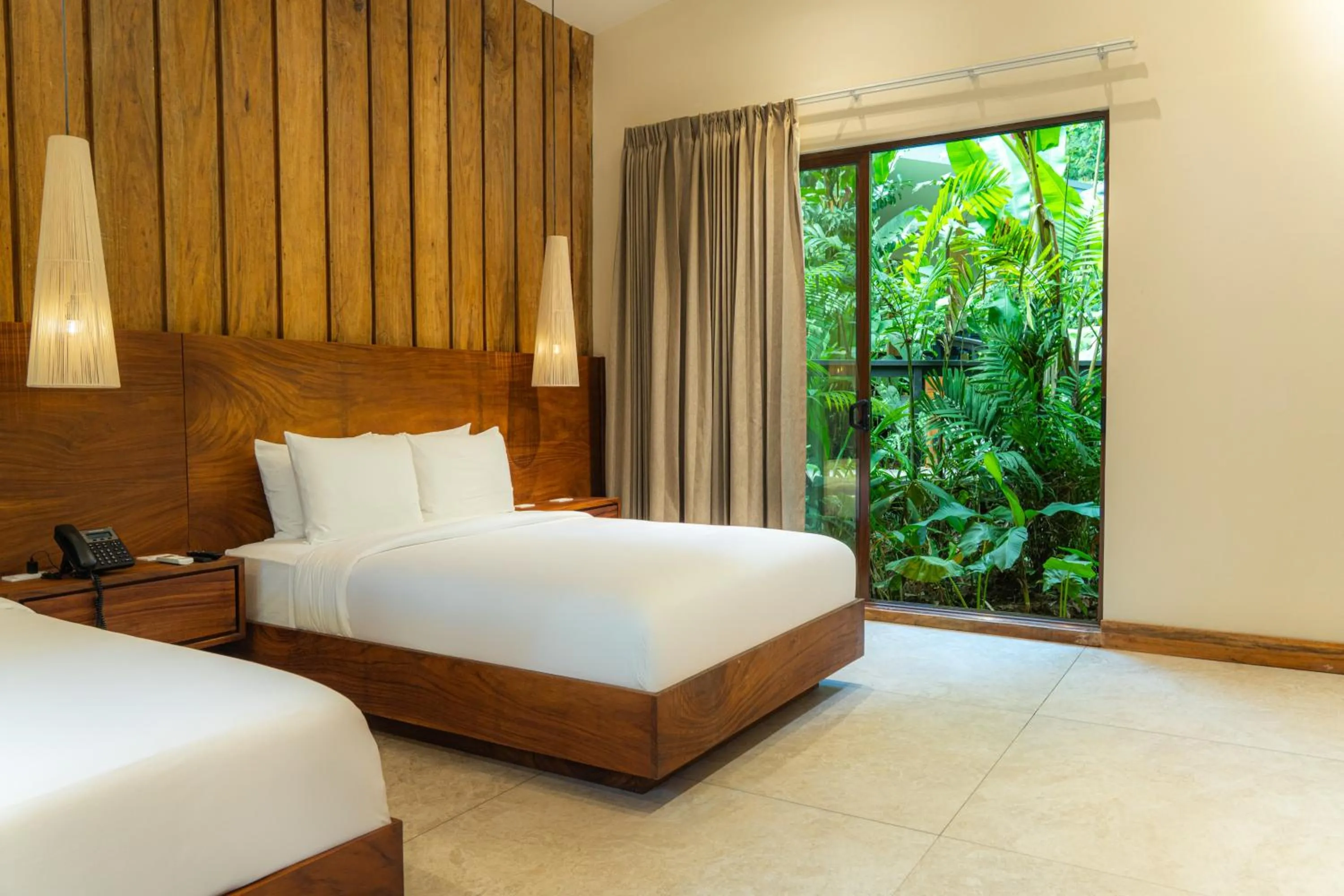 Bed in Chachagua Rainforest Hotel & Hot Springs