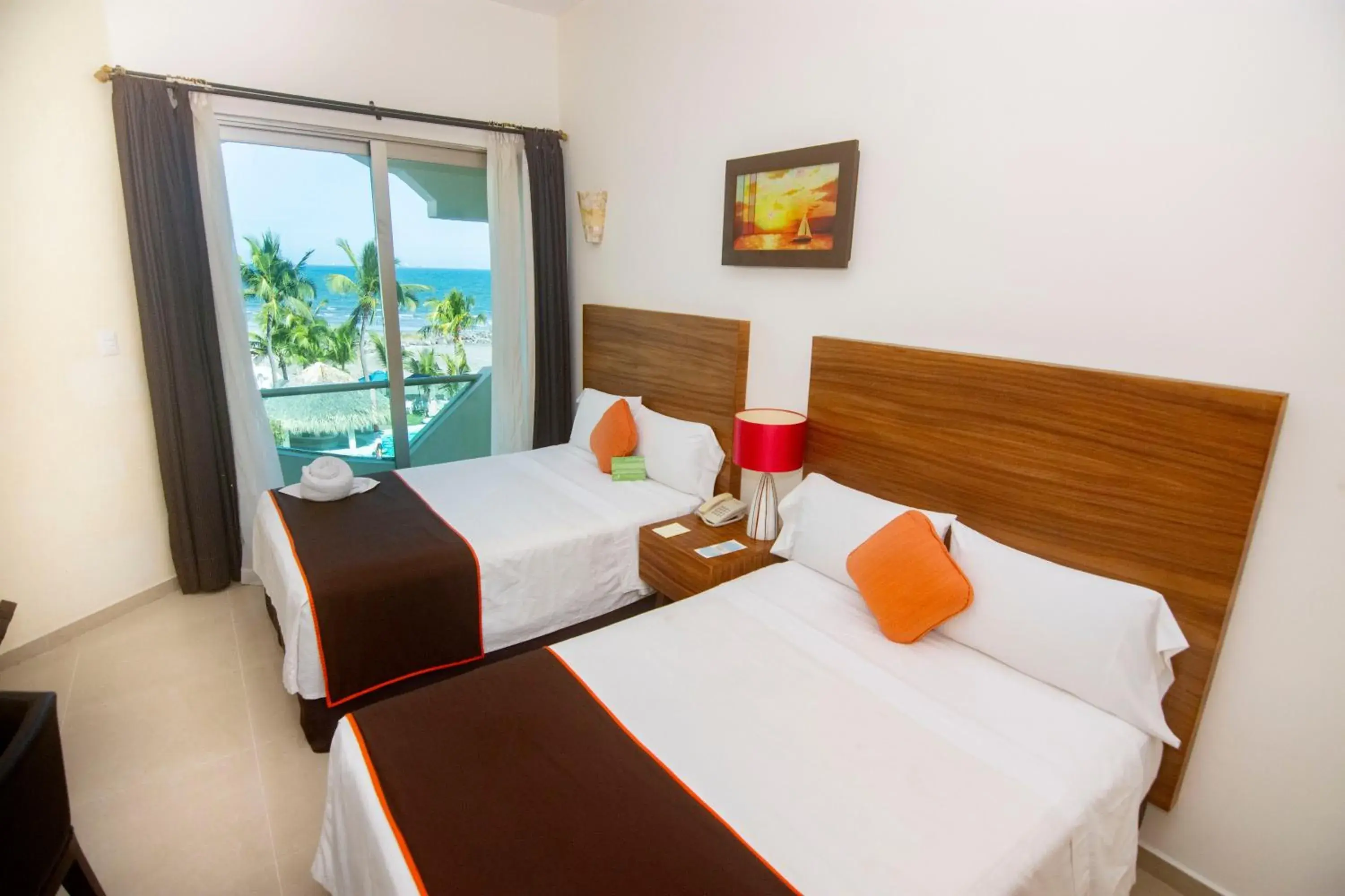 Photo of the whole room, Bed in Playa Caracol Hotel & Spa Photo of the whole room, Bed in Playa Caracol Hotel & Spa